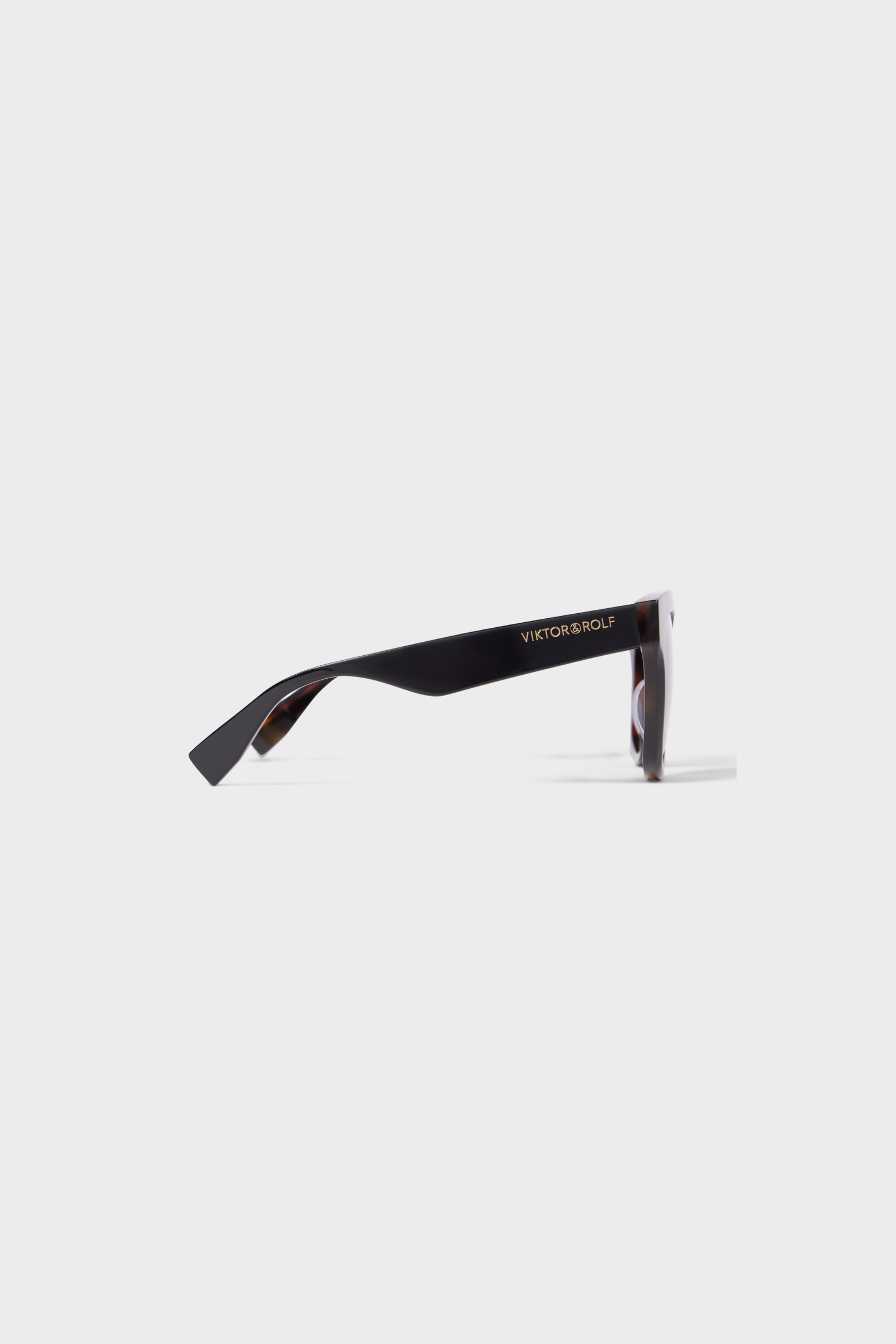 Black sunglasses with a brand logo on a white background