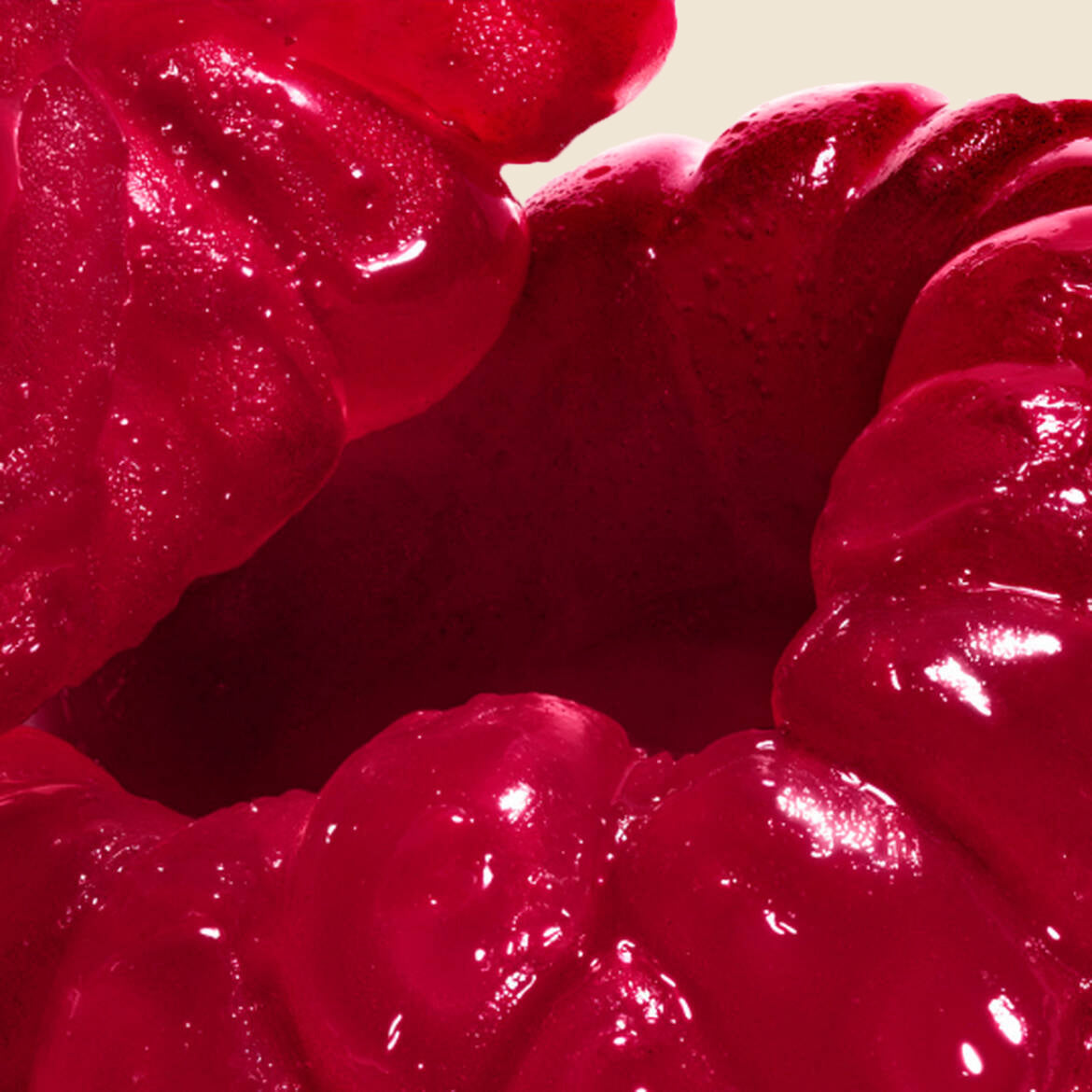 Juicy raspberry close up with water drops