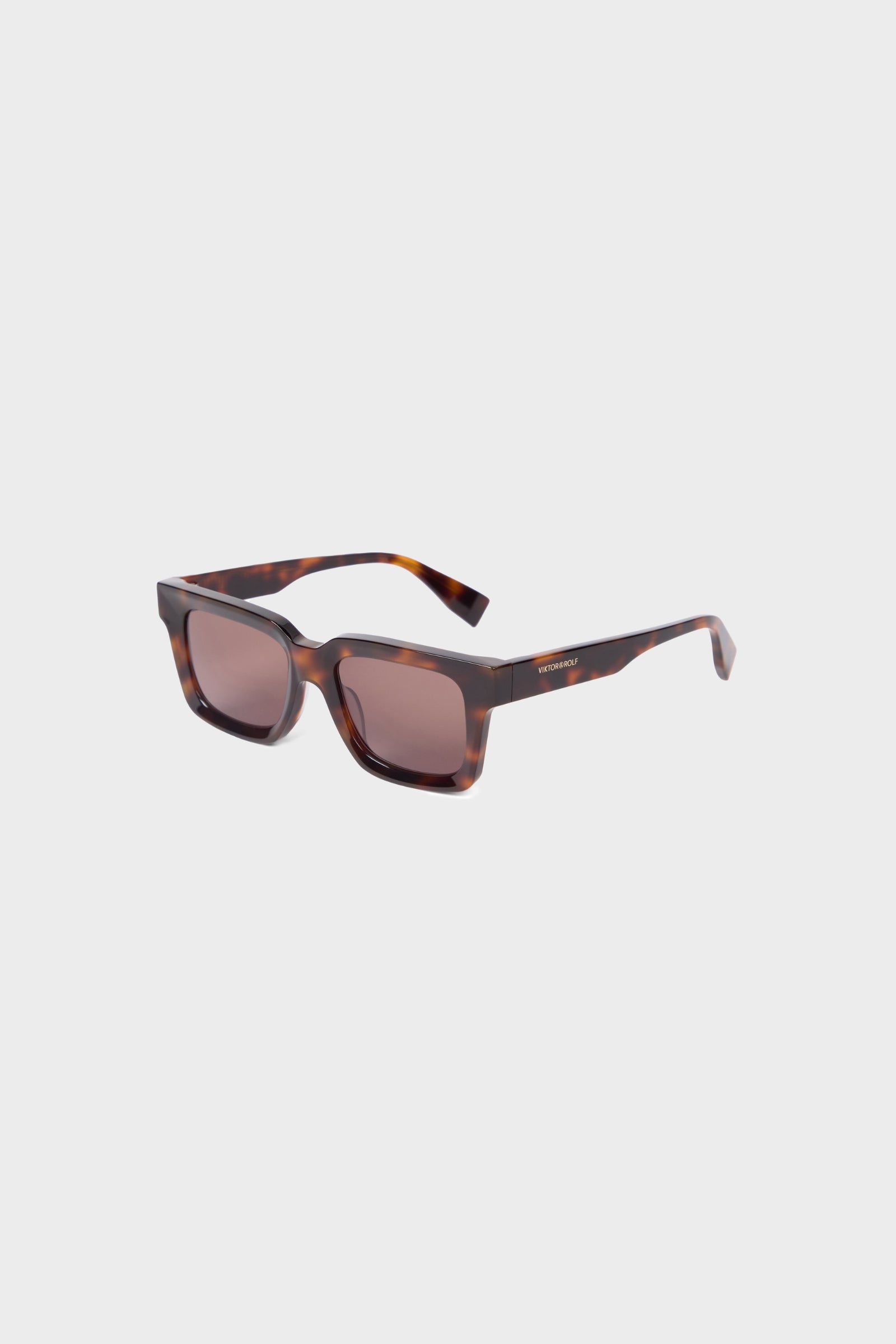 Square tortoise glasses on a white background.