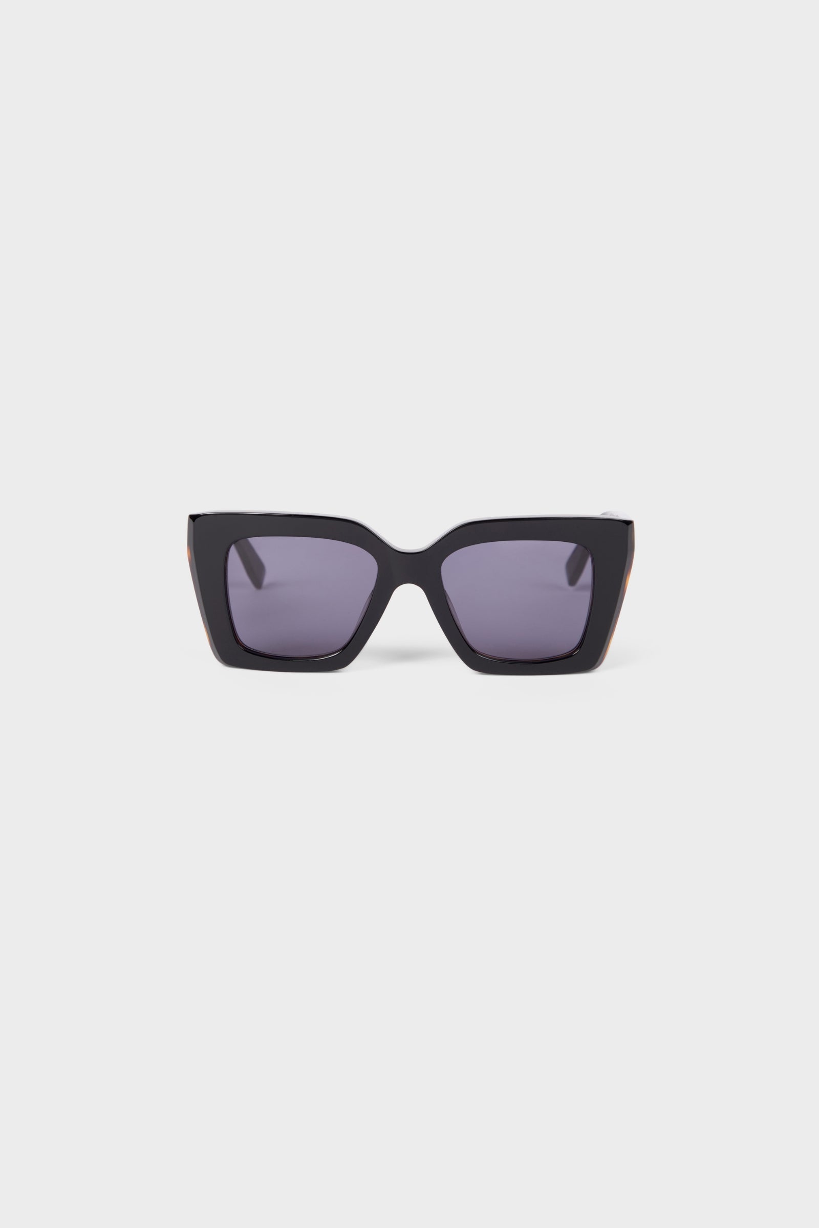 Black square sunglasses on a white background.