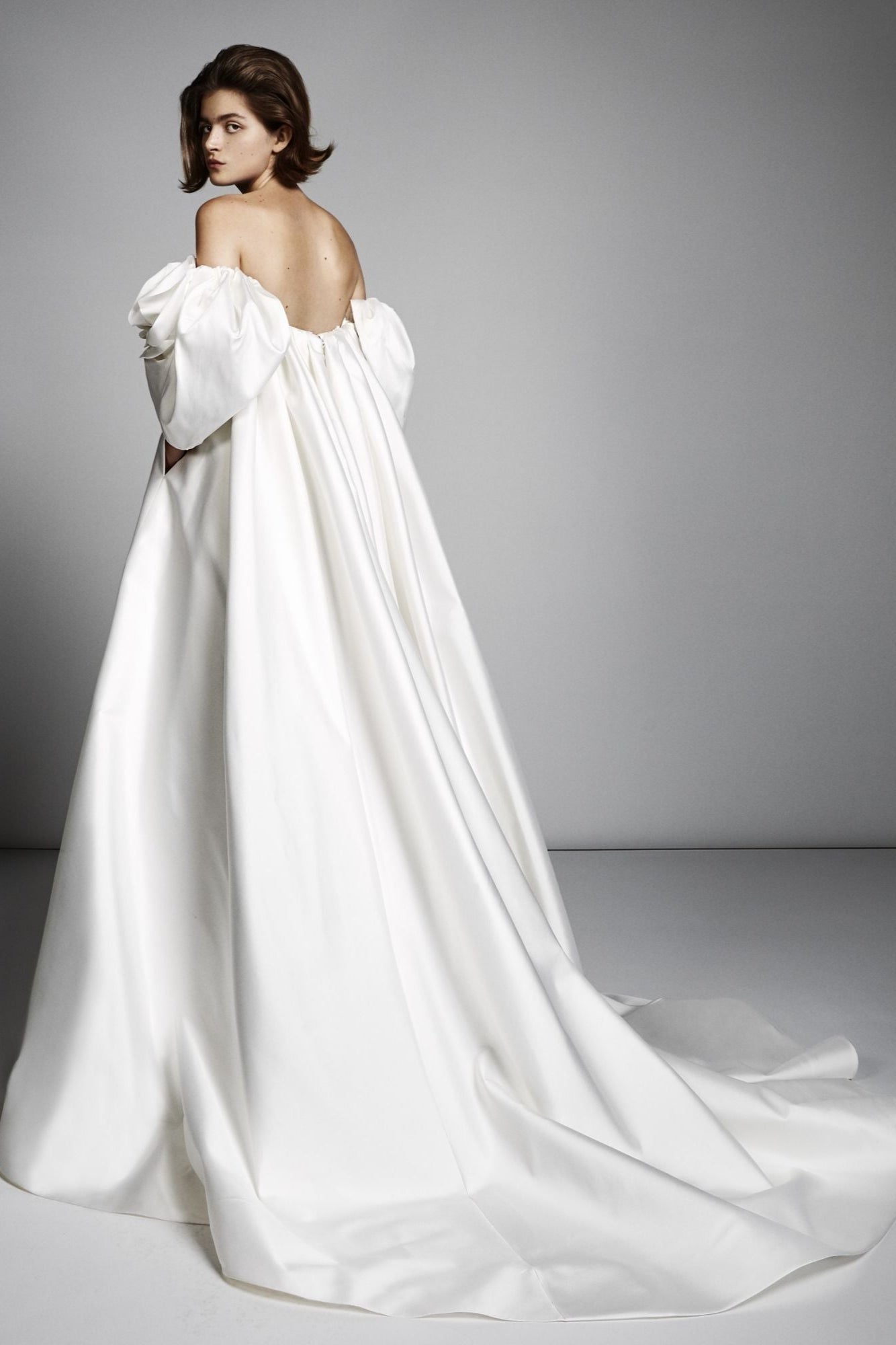 Dramatic, off-the-shoulder gown with a luxurious and voluminous silk blend skirt