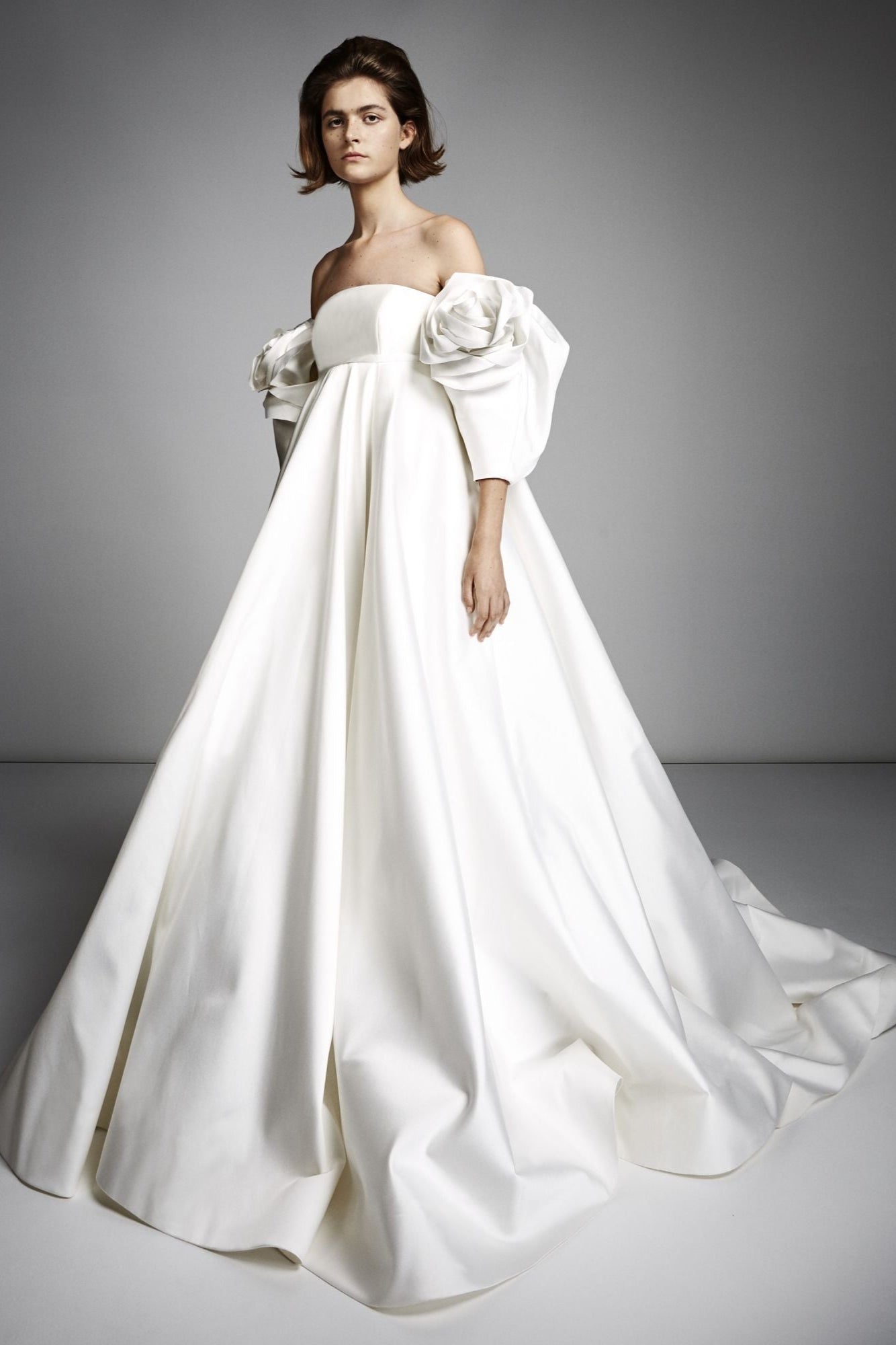 Dramatic, off-the-shoulder gown with a luxurious and voluminous silk blend skirt