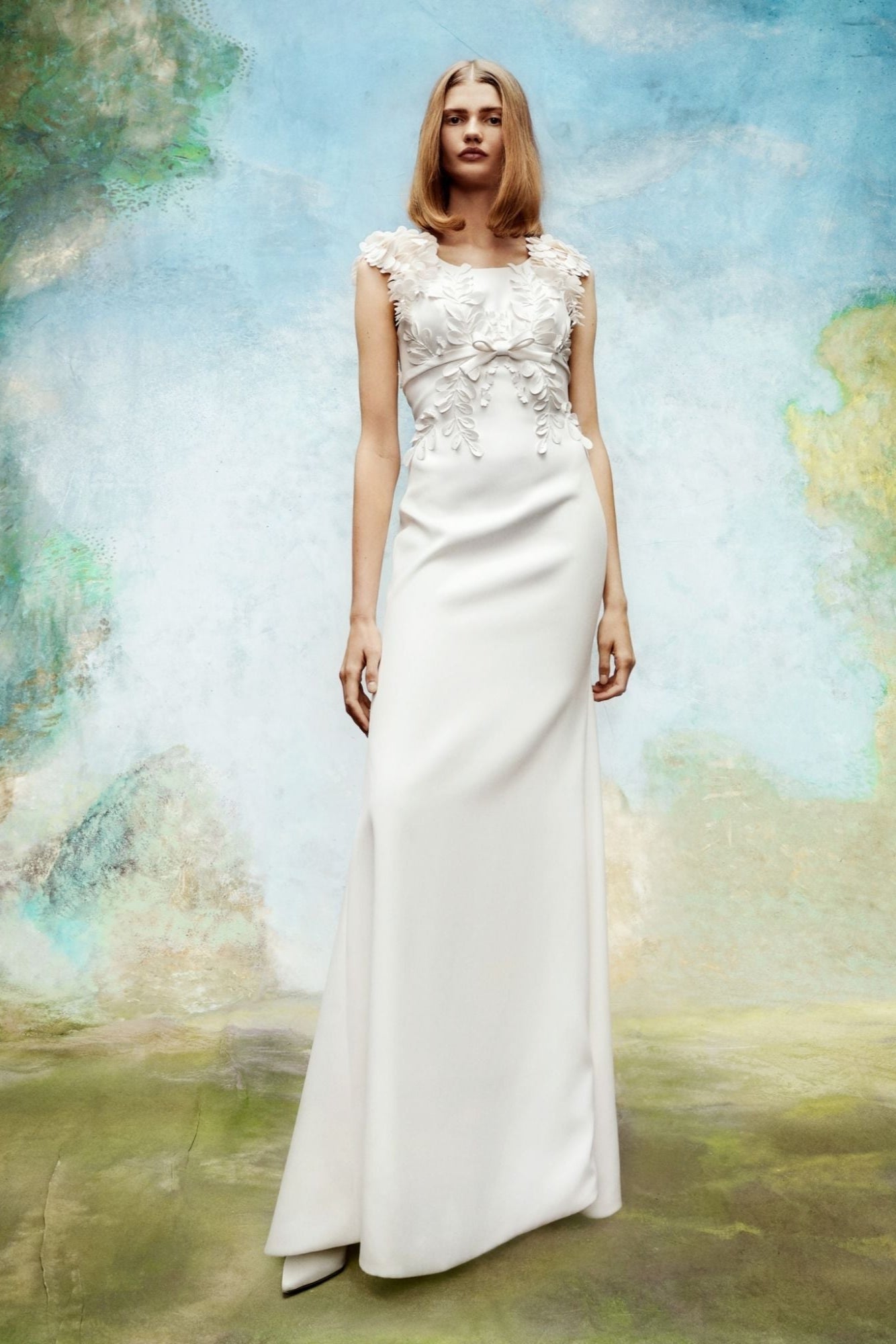 Crepe mermaid silhouette dress with boat neckline features a square open back