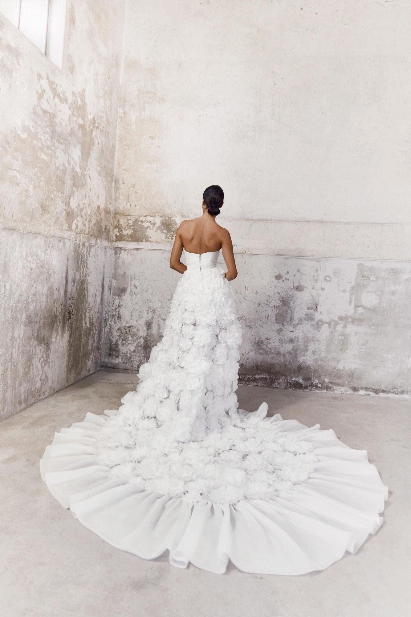 Viktor & Rolf Mariage Bridalwear Collection, Volant flower high-low gown with intricate floral detailing and elegant silhouette.