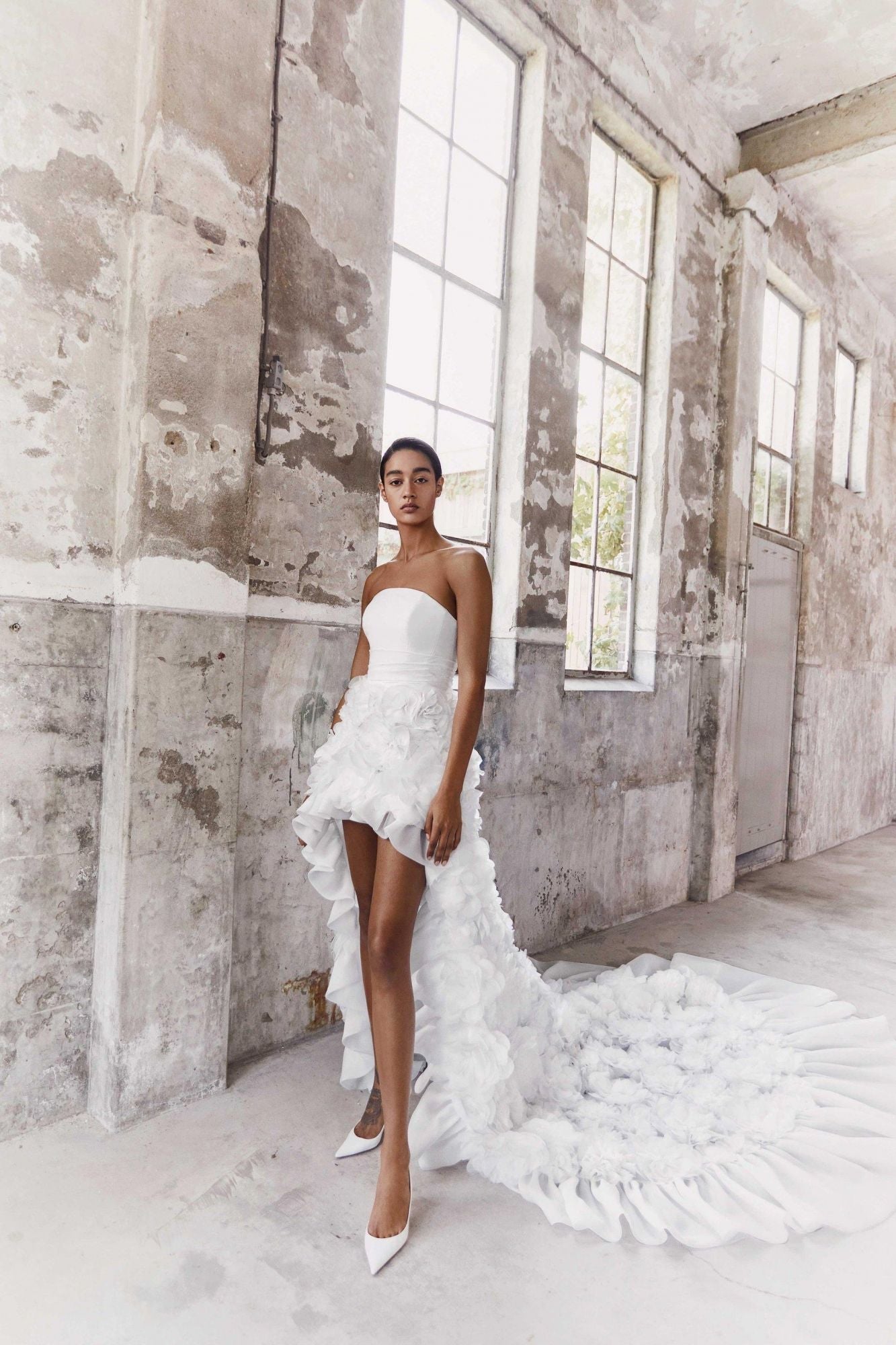 Viktor & Rolf Mariage Bridalwear Collection, Volant flower high-low gown, elegant design with flowing floral train.