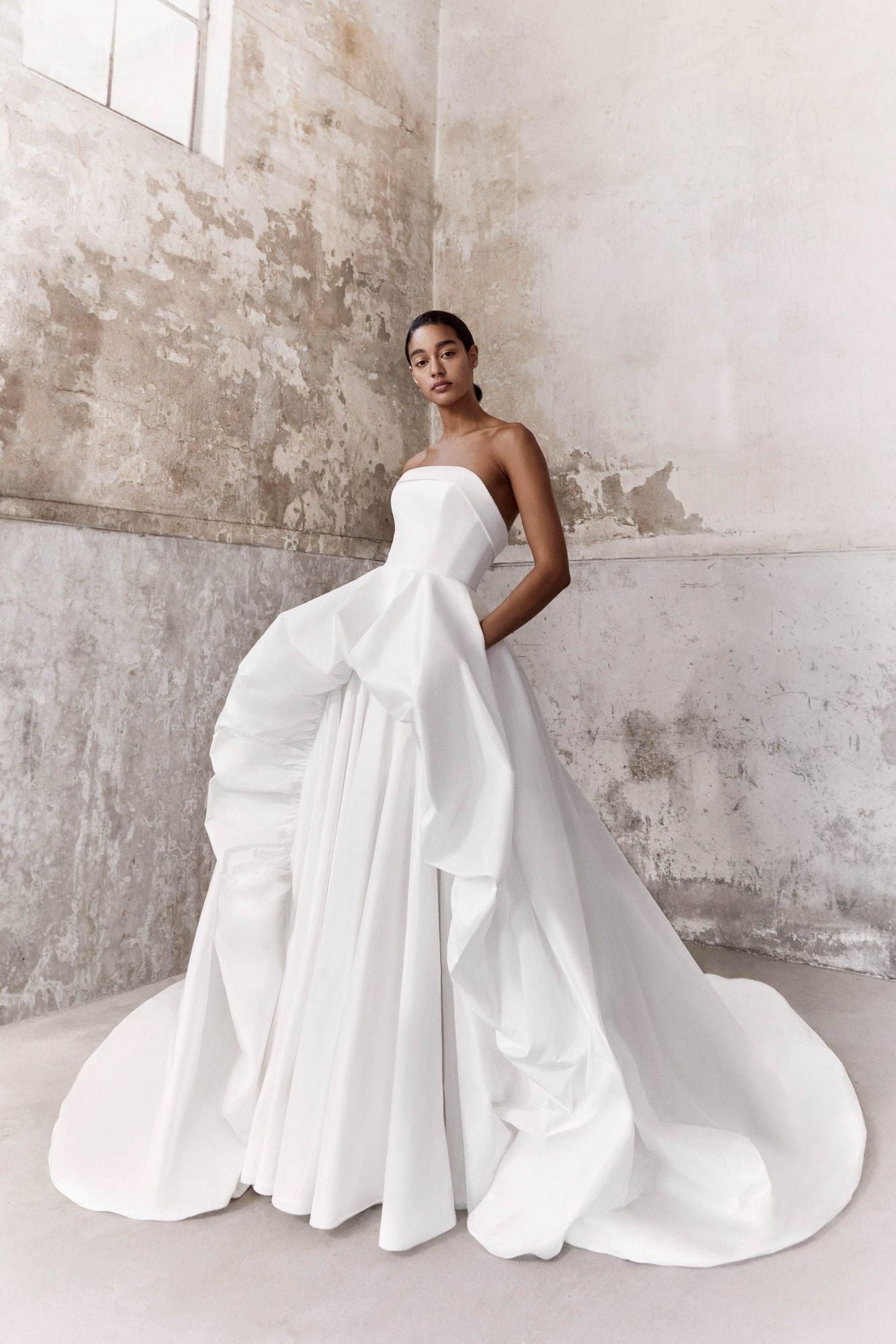 Viktor & Rolf Mariage Bridalwear Collection, Taffeta Volant Dream gown, strapless design with elegant flow and couture details.
