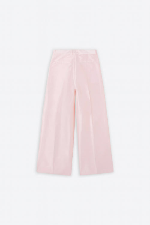 Pink satin pants on a white background.