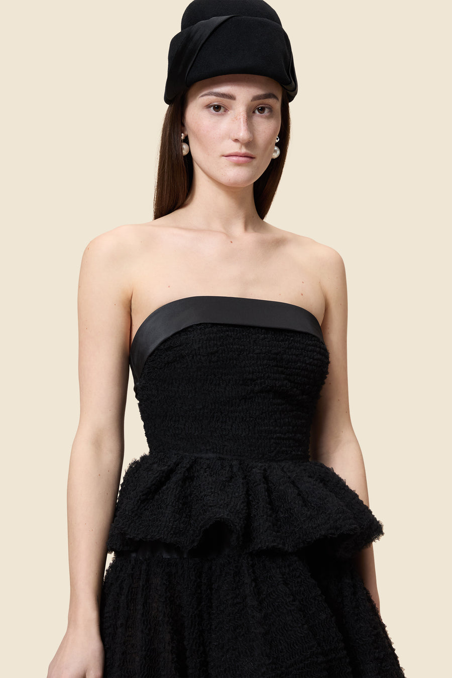 Inspired by the tulle from the ‘late stage capitalism waltz’ haute couture collection, the top features hand crafted tulle ruffles for a feminine texture