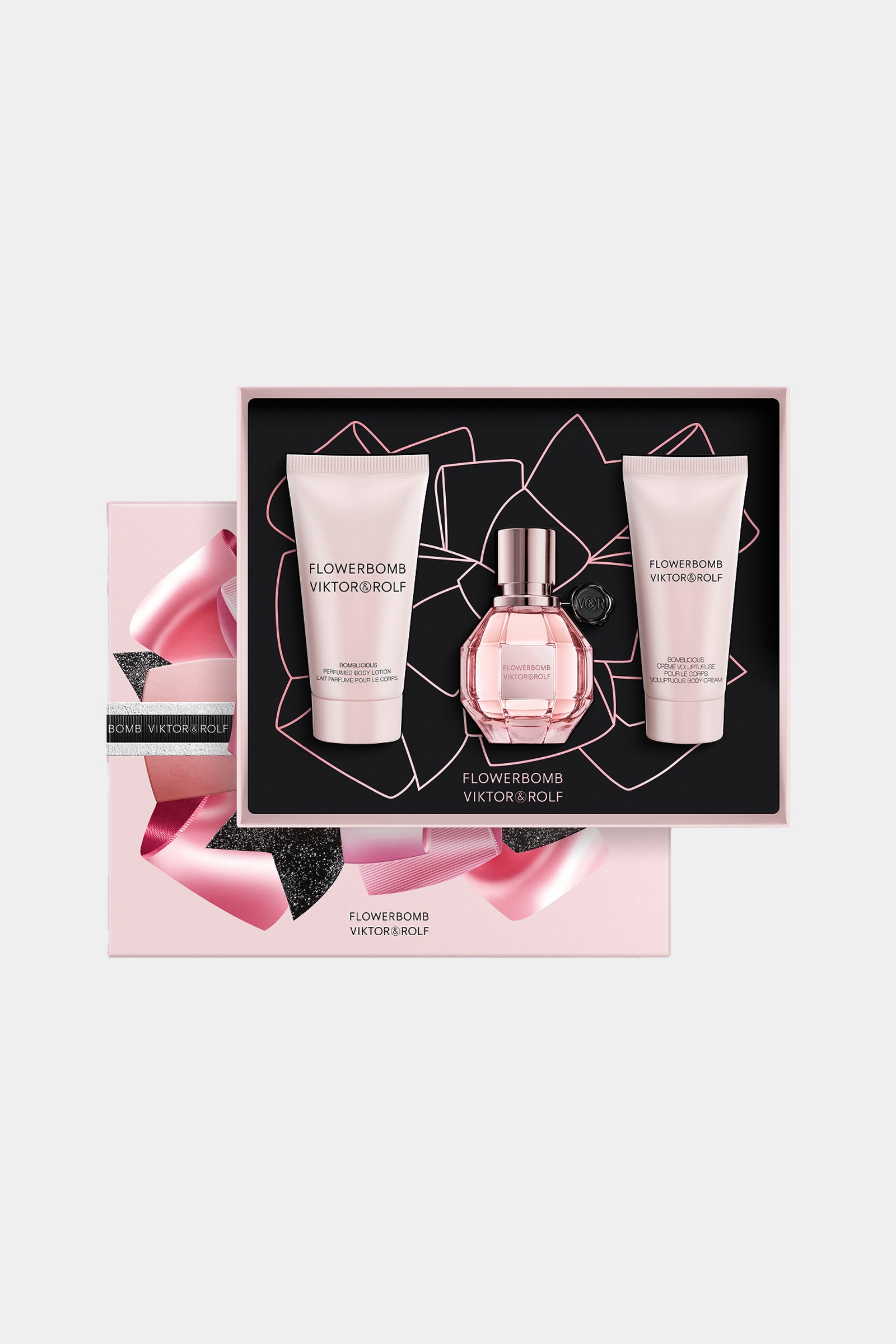 The Flowerbomb perfume gift set in a pink packaging on a white background.