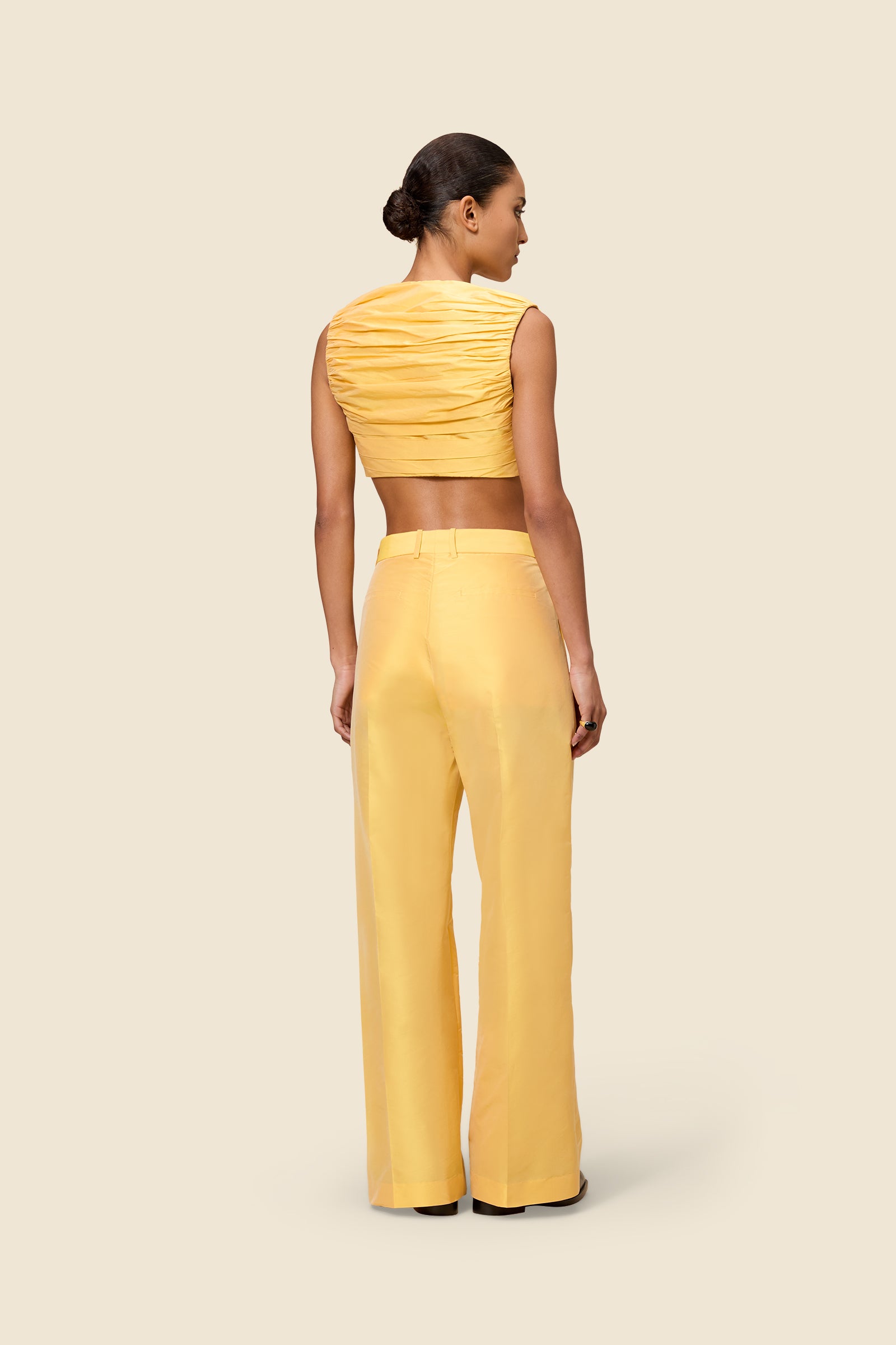 Crafted from silk-blend taffeta, the straight leg trousers offer a tailored fit and timeless elegance