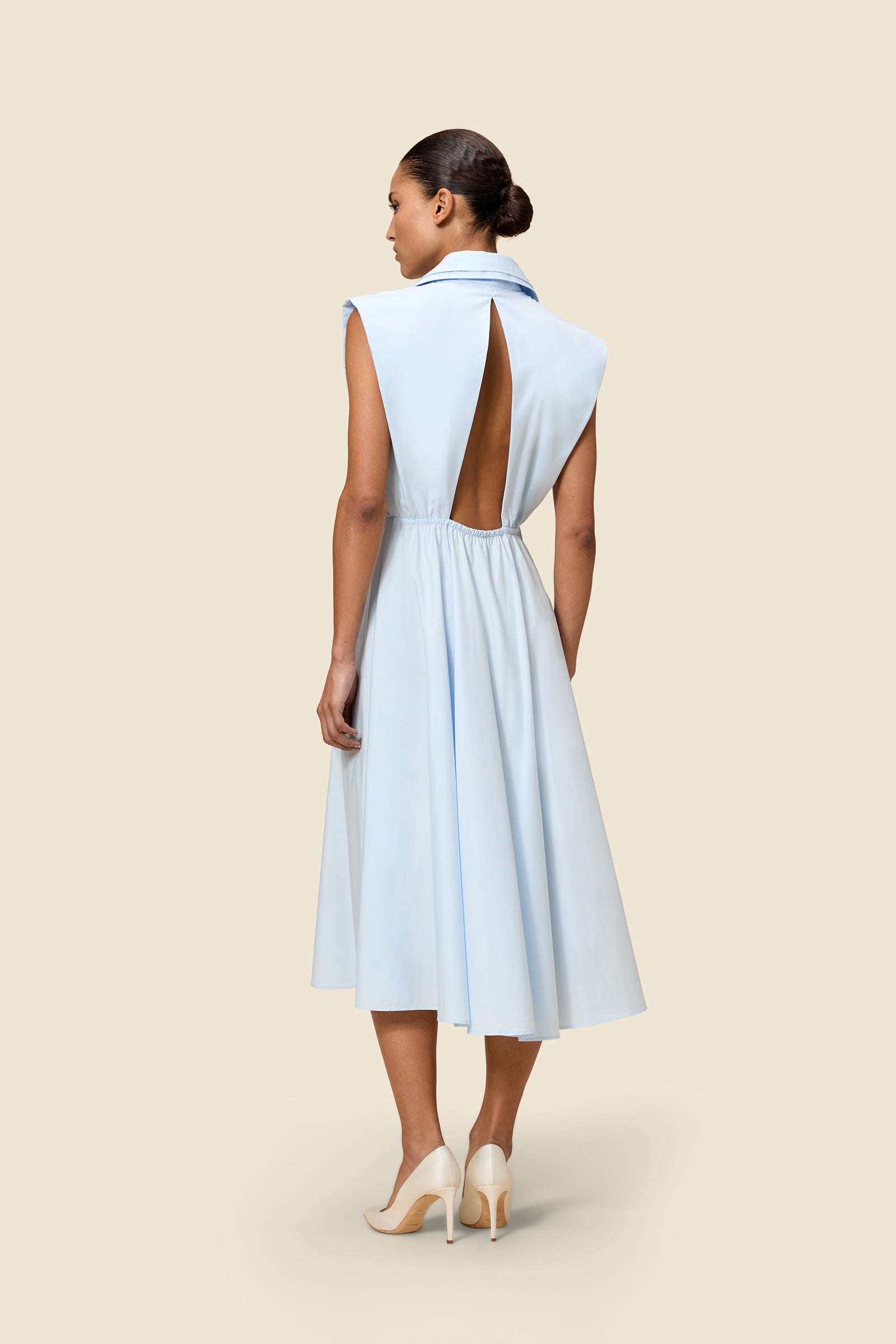 The dress is a classic staple with a viktor&rolf signature layering twist, inspired by the ‘one woman show’ haute couture collection