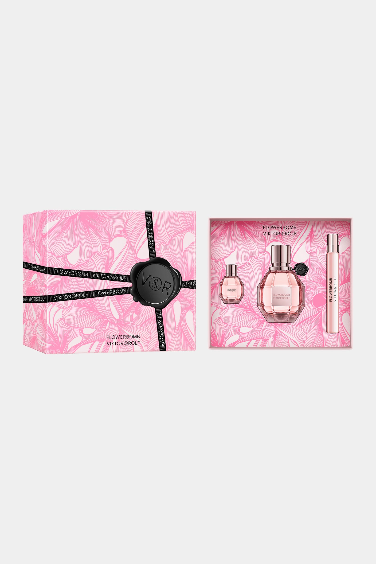 The Flowerbomb perfume trio gift set in a pink packaging on a white background.