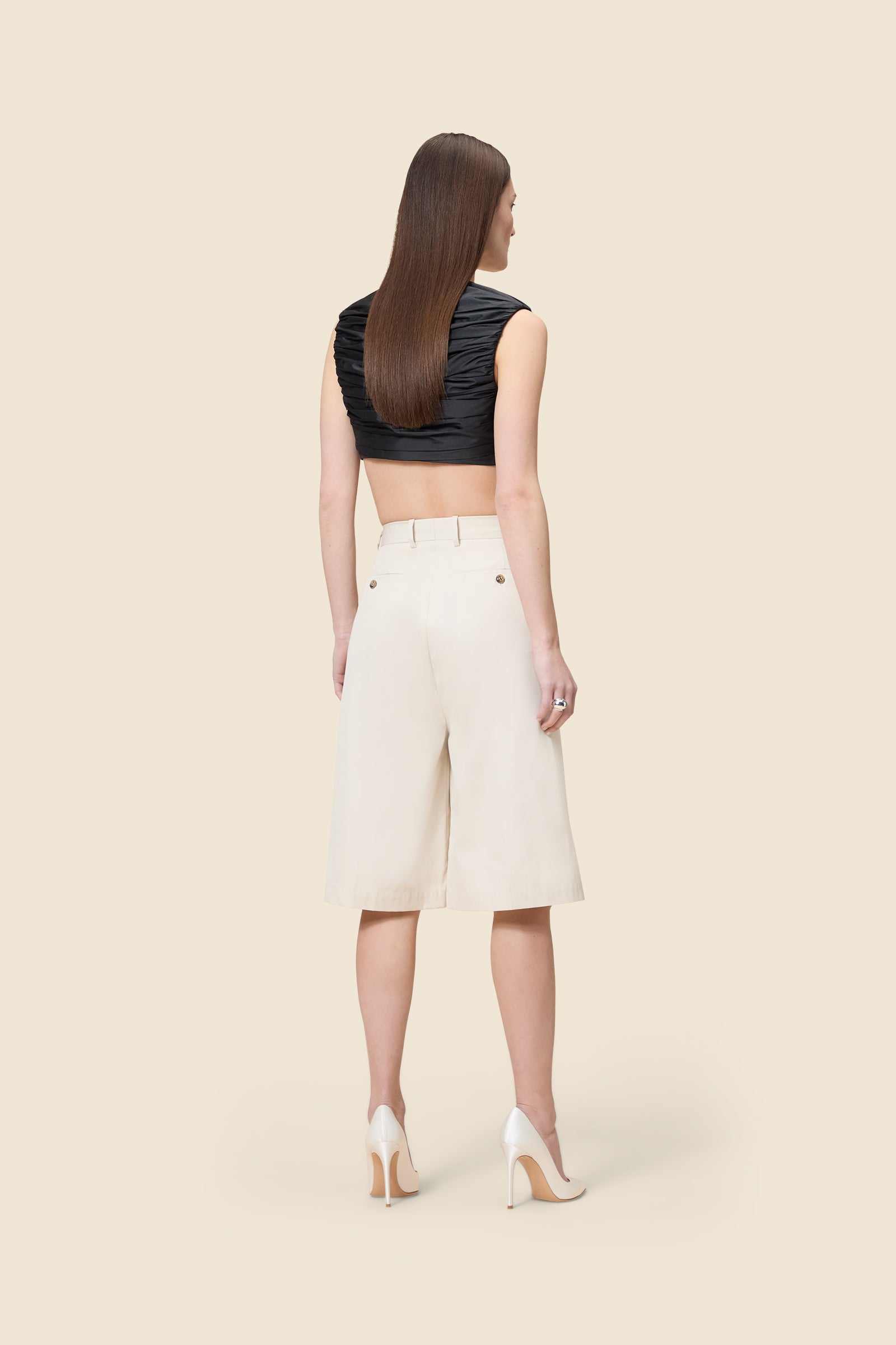 Drawing from viktor&rolf’s haute couture ‘red carpet’ collection, the trouser transforms traditional menswear patterns into a feminine, glamorous silhouette