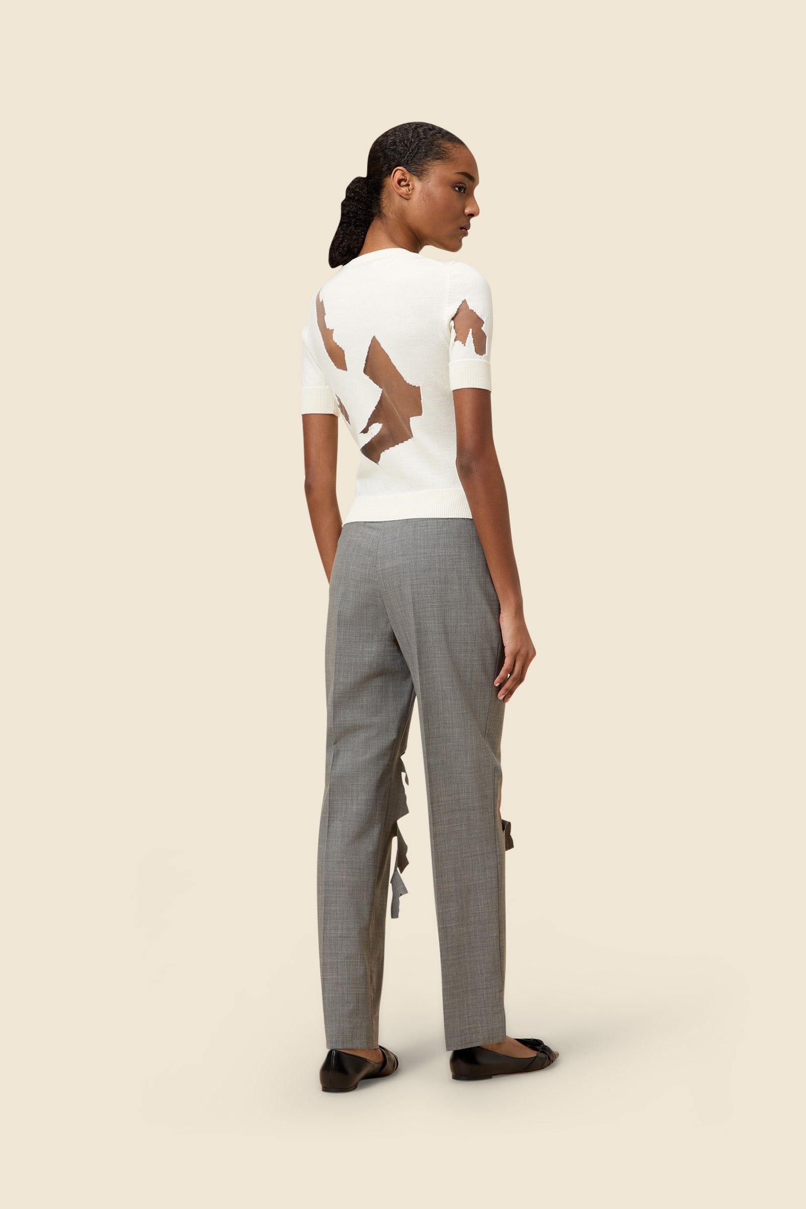 The laser cut hemlines and pleated japanese bonded satin embrace vitkor&rolf's scissorhands signature details in a dress