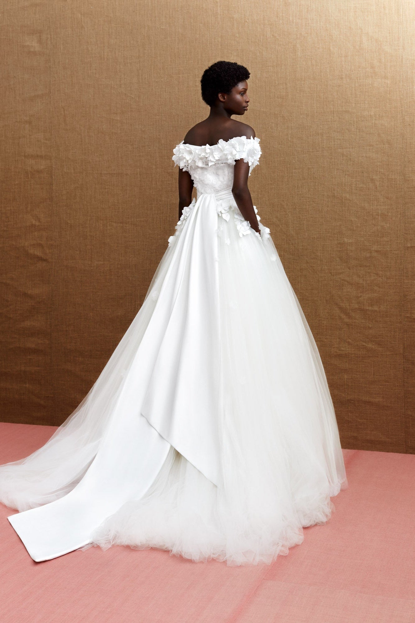 Off-shoulder tulle ball gown with a satin bodice