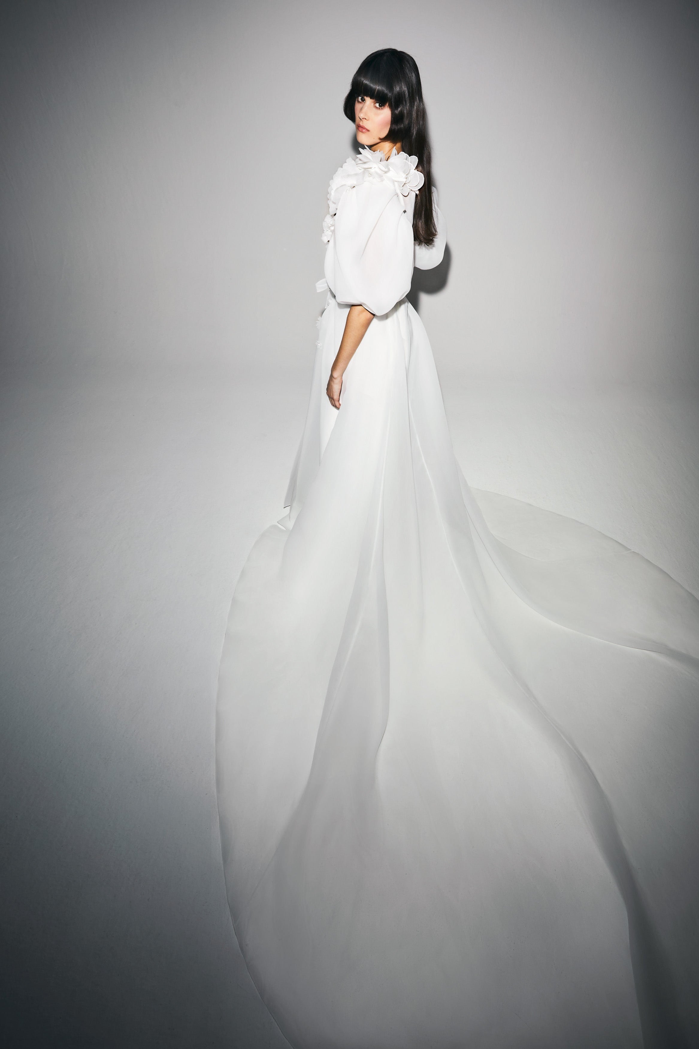 Sheer organza overcoat, featuring delicate puffed sleeves and a plunging v neckline edged with sheer organza flower details