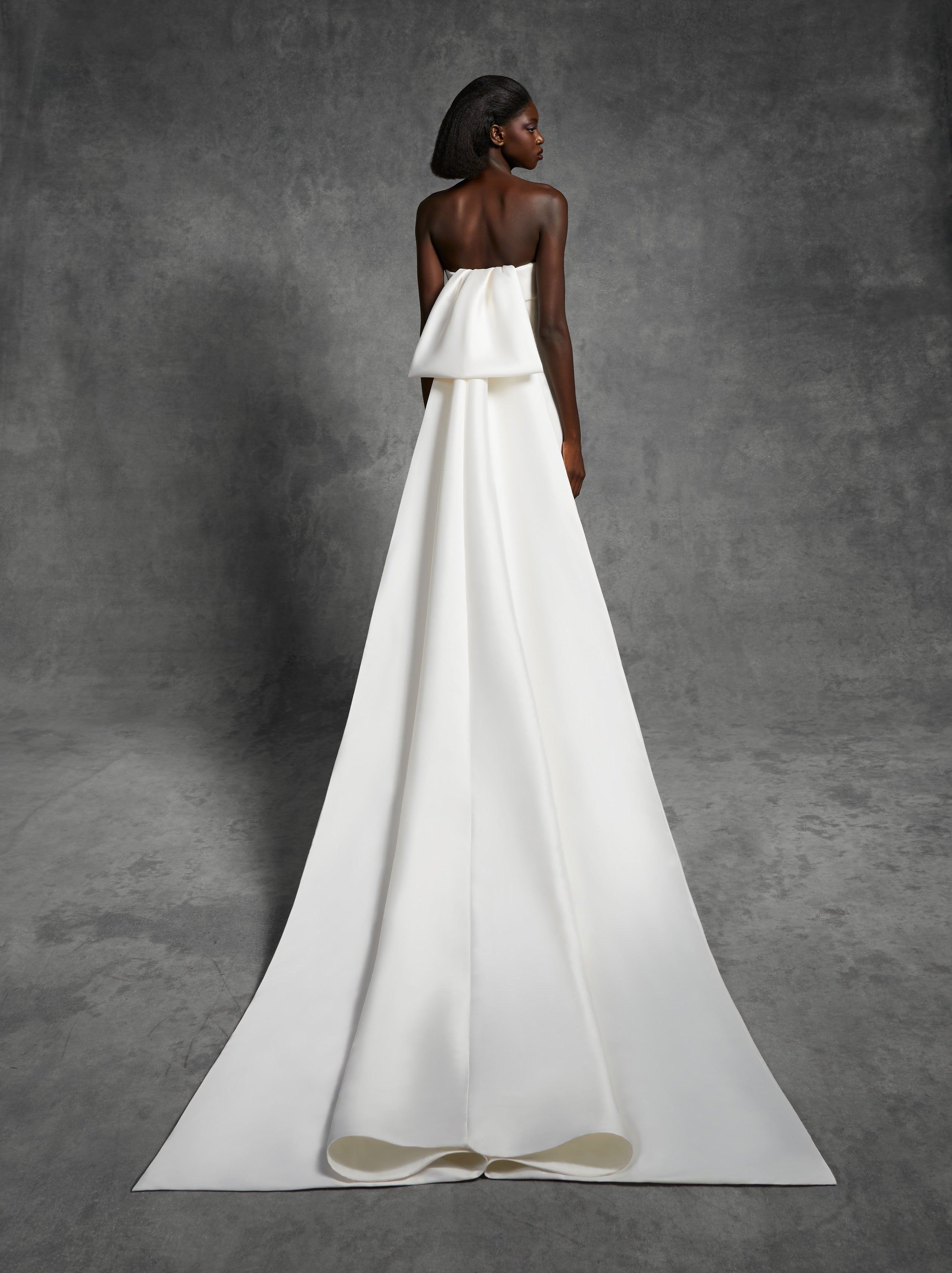 Viktor & Rolf Mariage Bridalwear Sophisticated Mermaid gown, elegant strapless design with minimalist couture elegance.