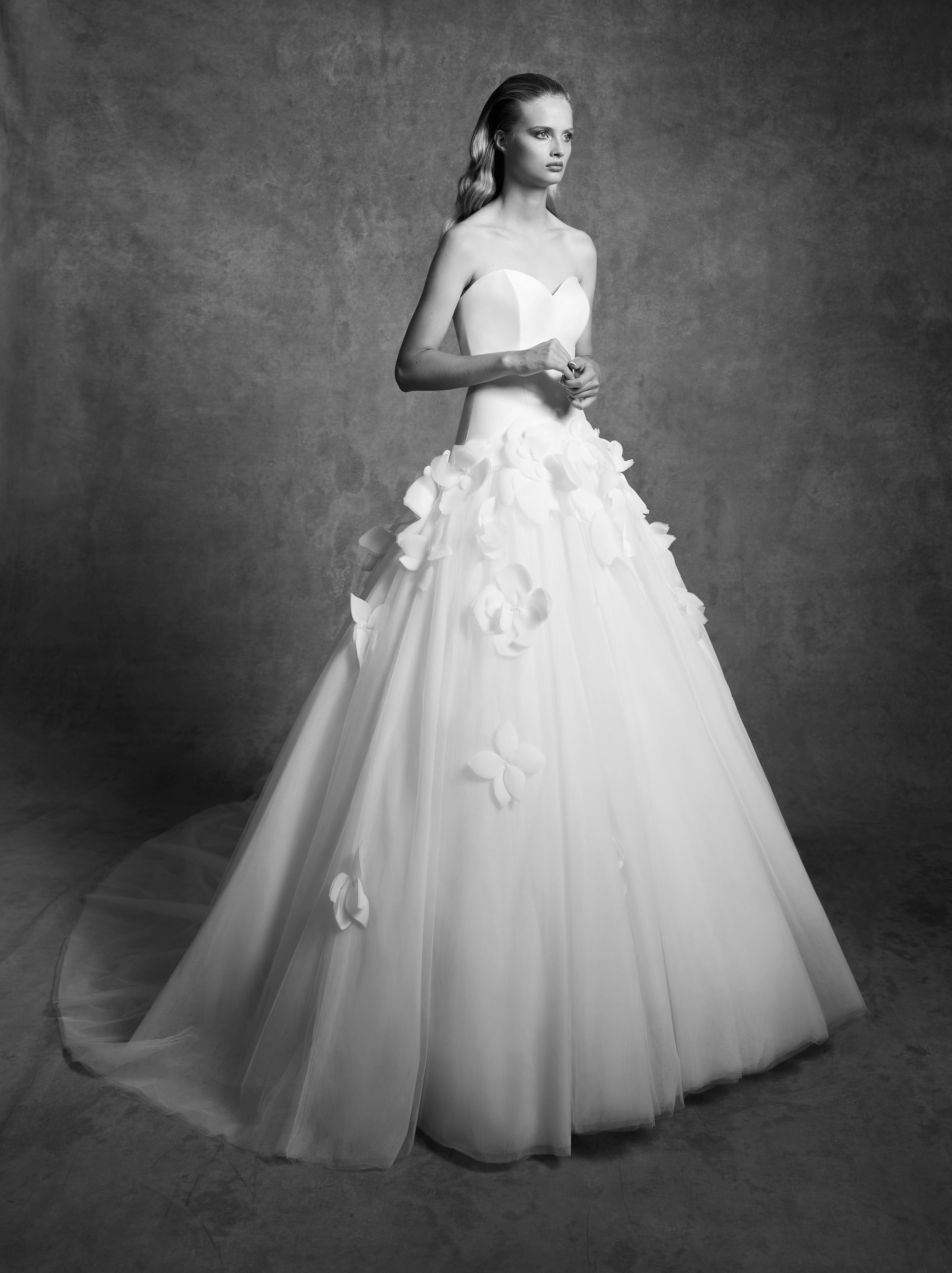 Viktor & Rolf Mariage Bridalwear Collection, Watteau feathered flower gown with sculptural elegance and couture detailing.