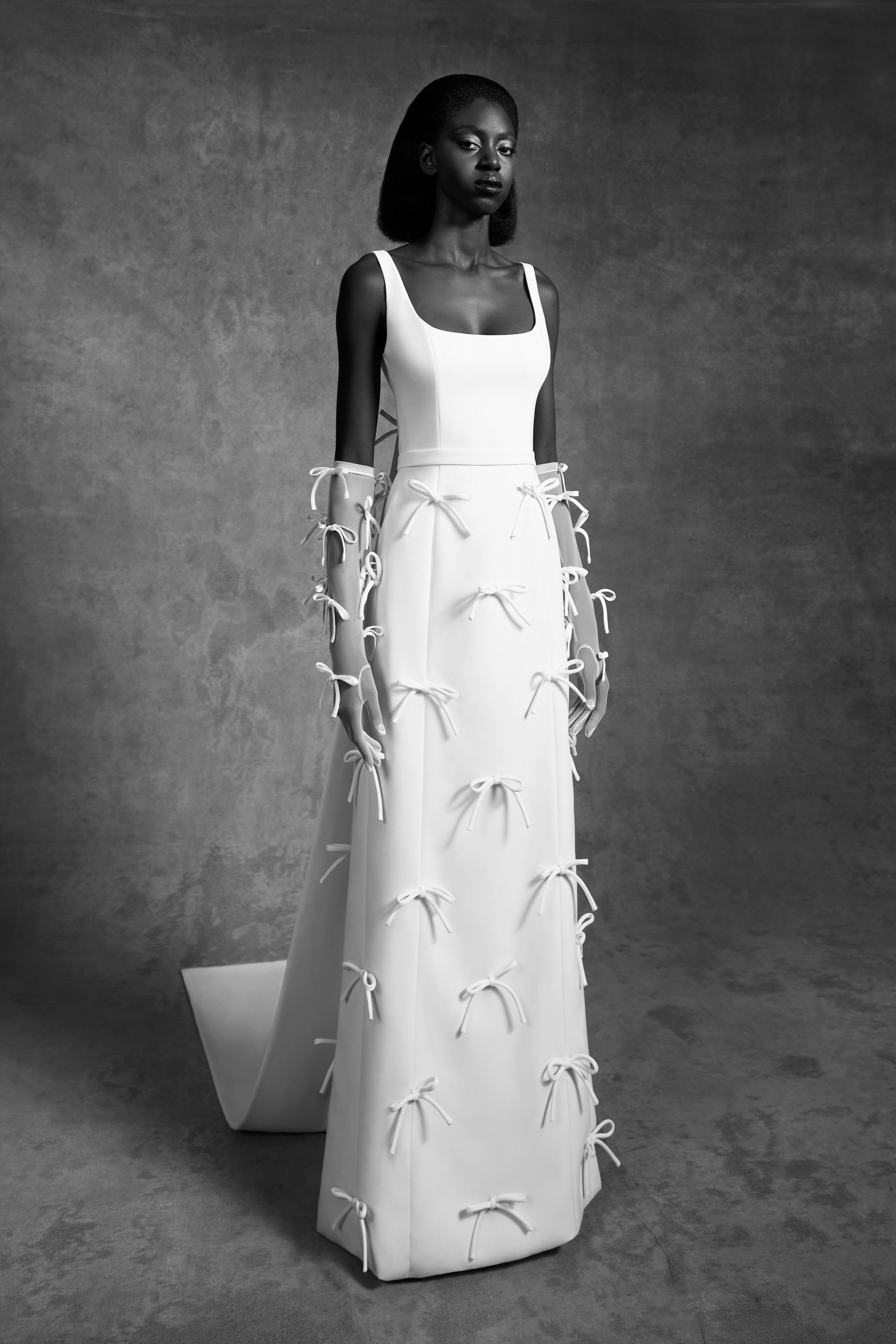 Timeless empire gown with a classic squared neckline and empire waistband, crafted from double-faced crepe with a matte finish