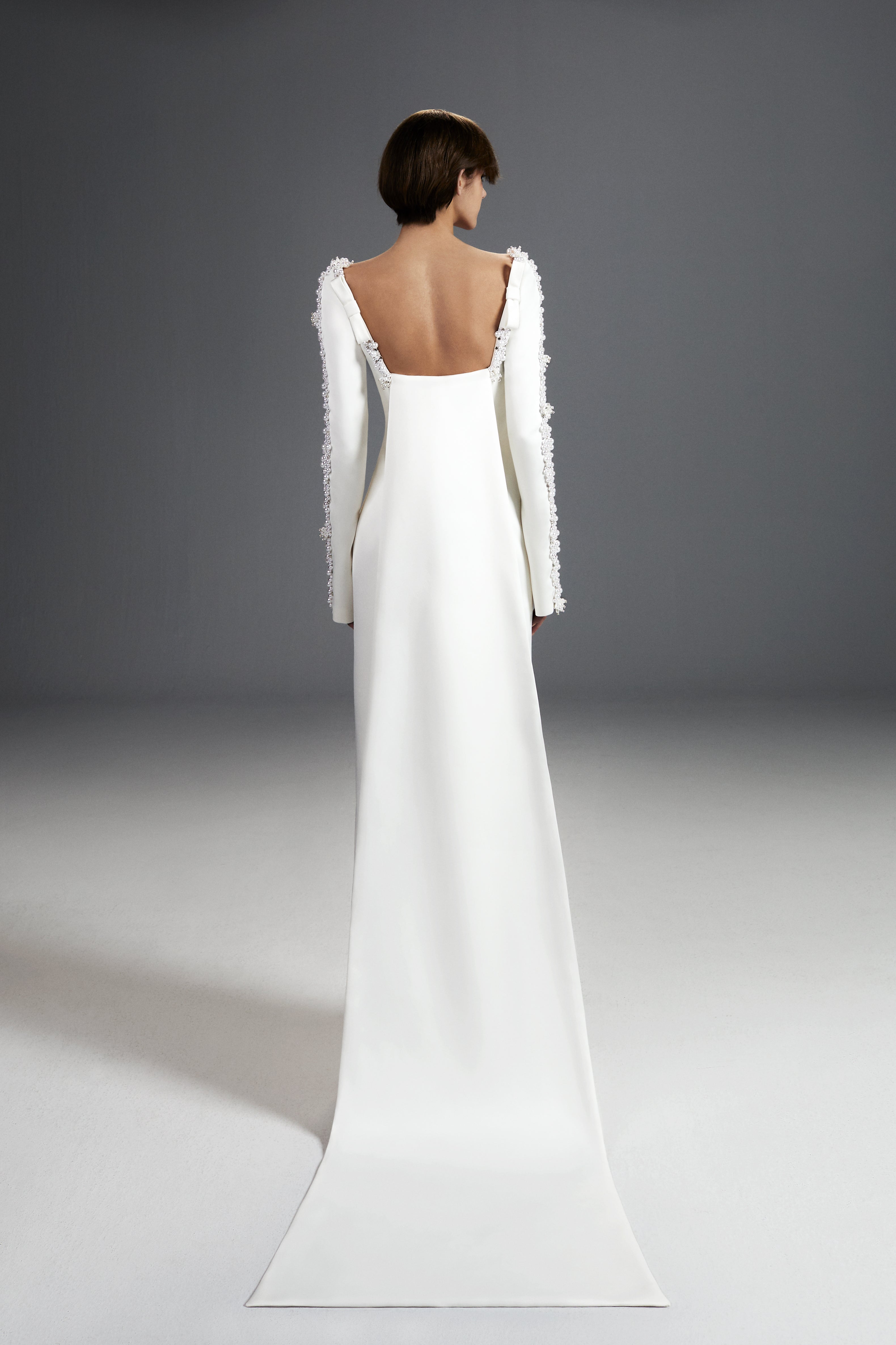 Viktor & Rolf Mariage Bridalwear Collection, Tales of Pearls column gown with delicate detailing and elegant minimalist design.