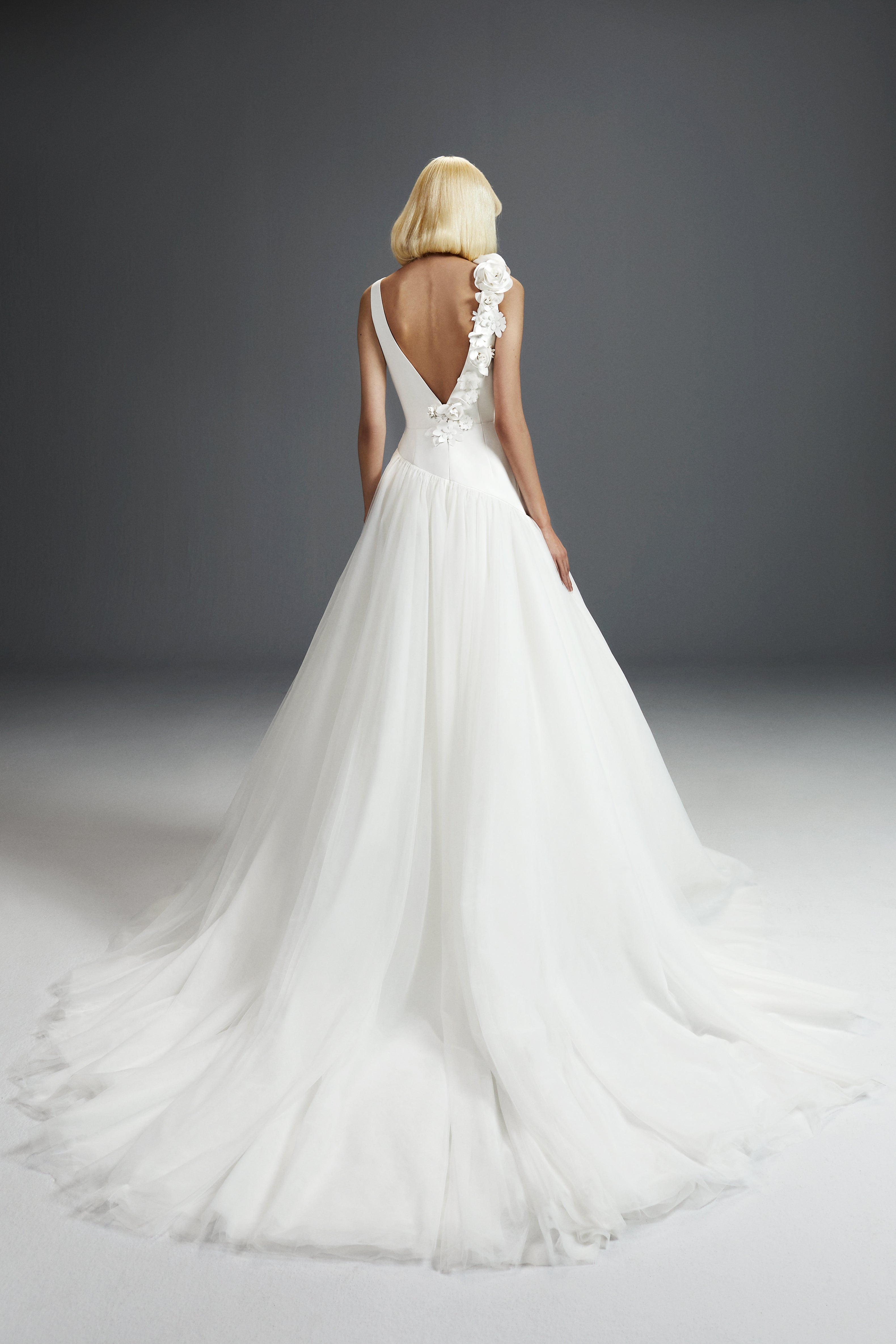 Viktor & Rolf Mariage Bridalwear Collection, Flower bouquet tulle gown, elegant design with floral appliqué and delicate tulle skirt.