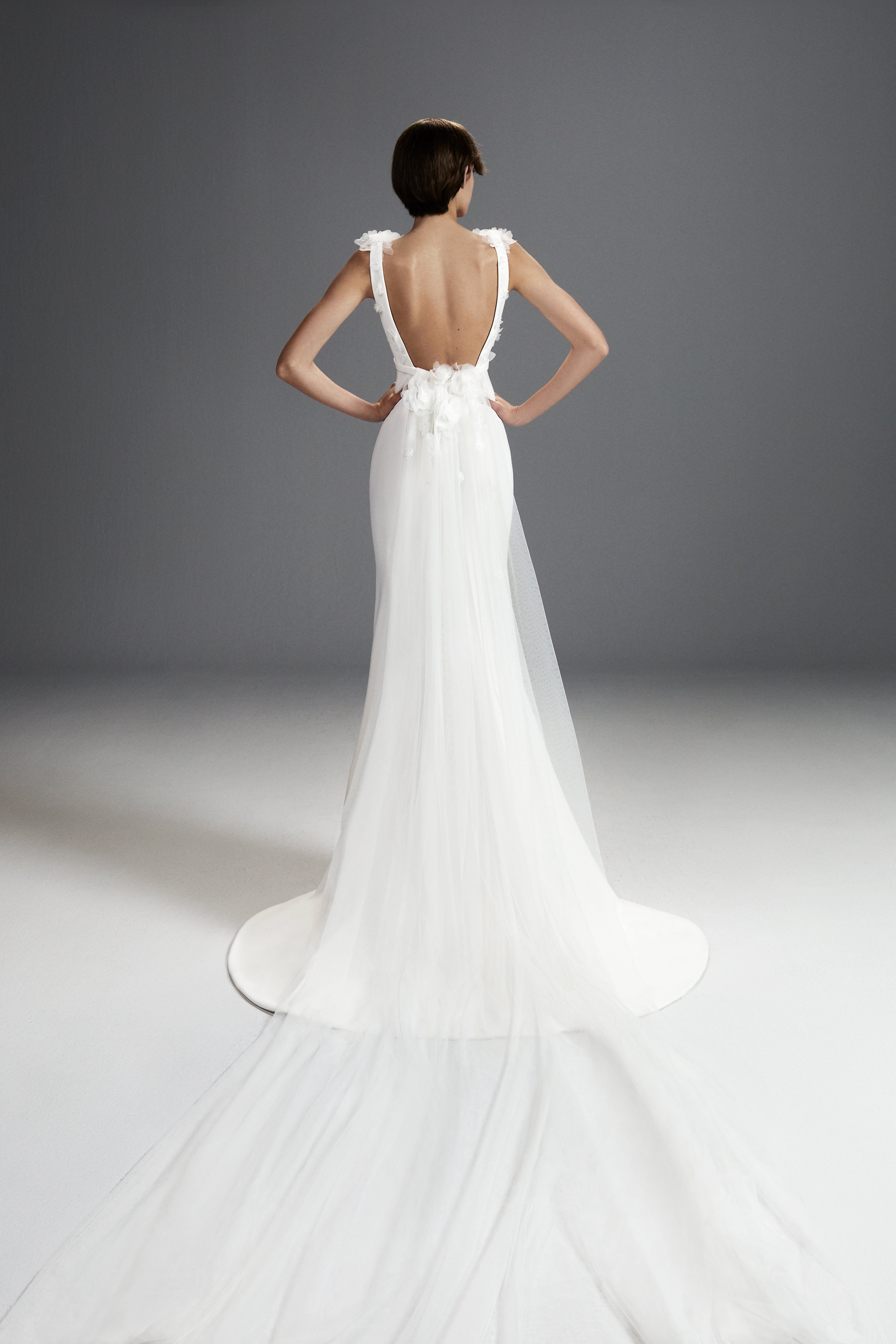 Viktor & Rolf Mariage Bridalwear Collection, Flower Bouquet Column Gown, elegant backless design with exquisite floral details.