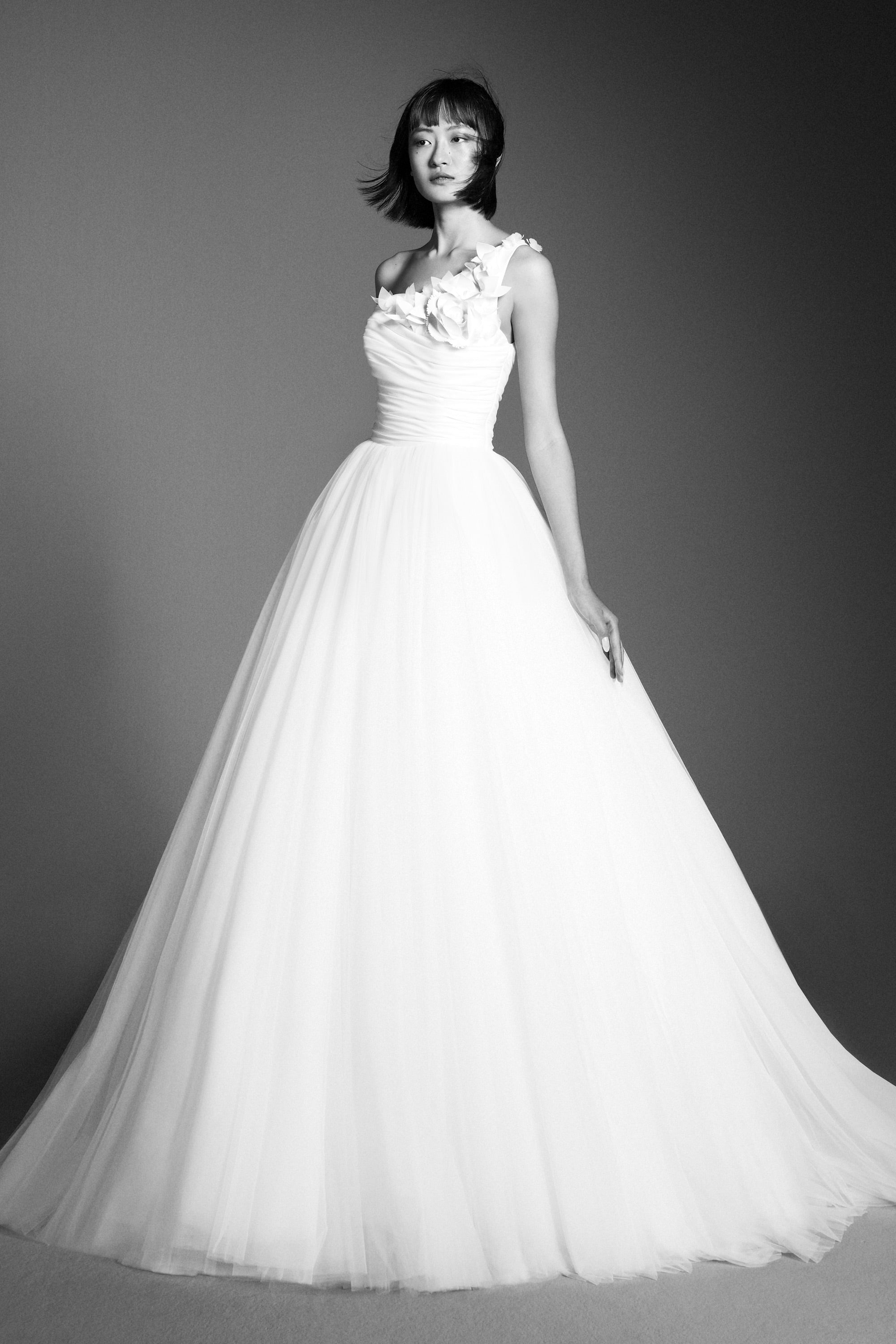 Lovely gown crafted from tulle with a mikado organza draped bodice