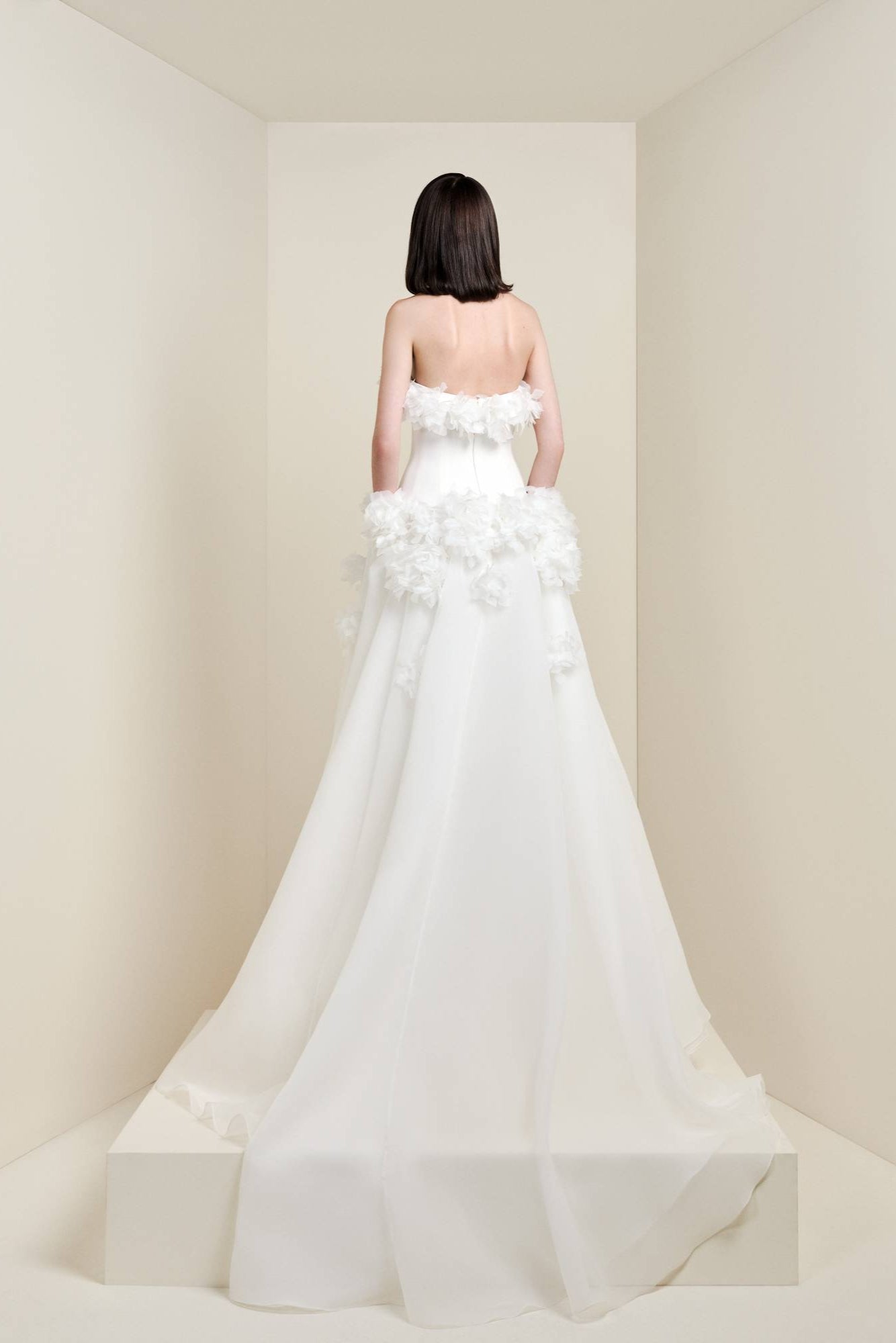 The ‘romantic hortensia garden a-line’ combines a stretch crepe bodice with an organza skirt