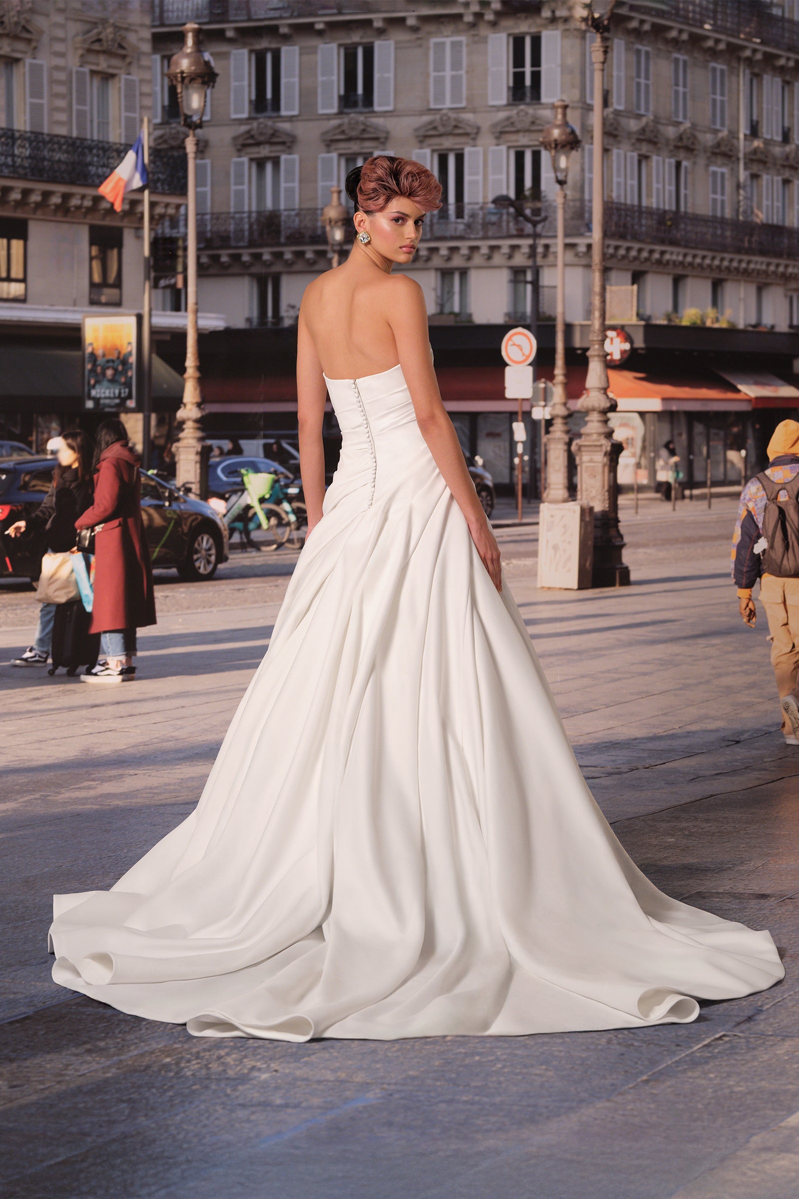 This breathtaking a-line gown in light mikado showcases a masterful twisted drape technique that enhances its sculptural sweetheart neckline, from the Viktor&Rolf Mariage collection.