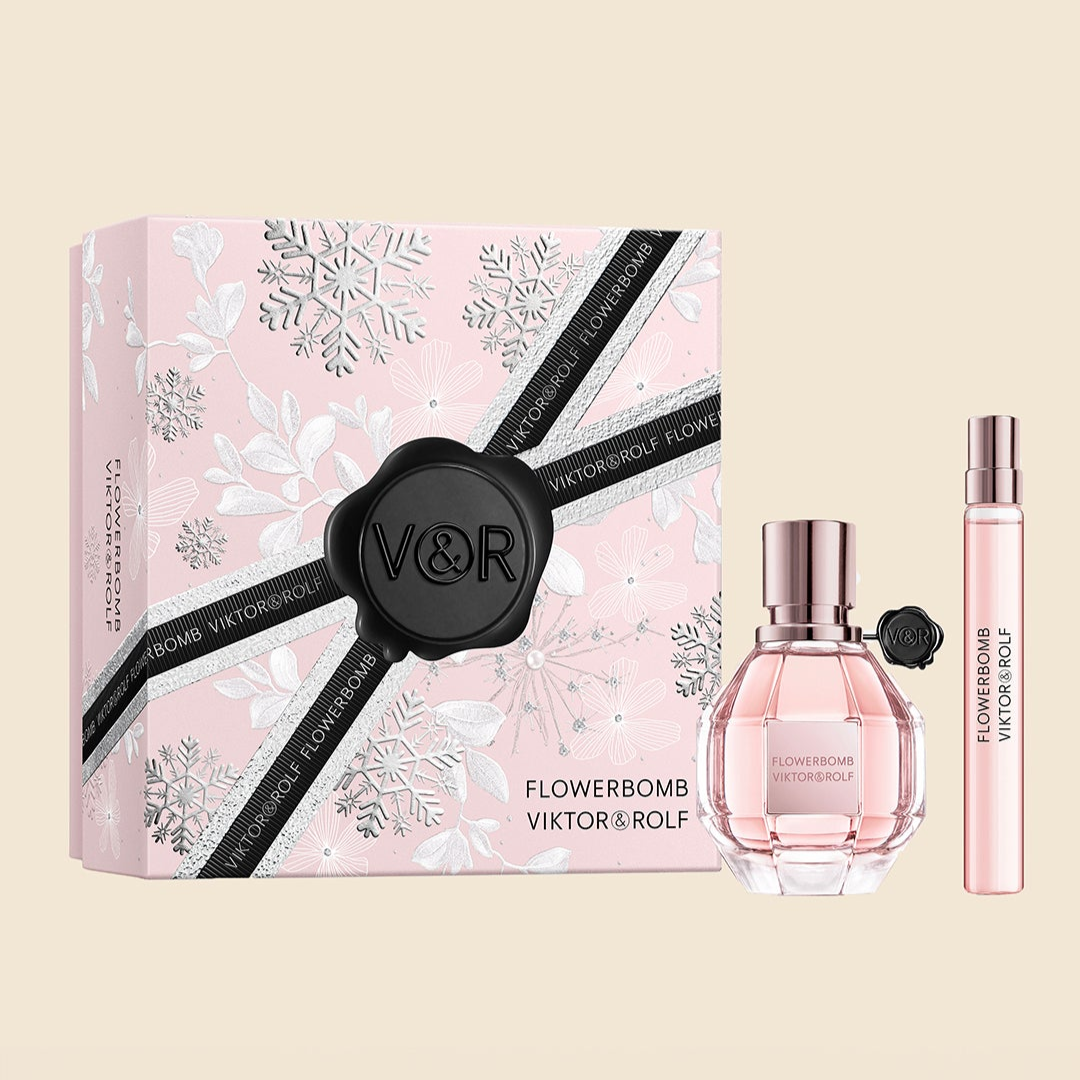 Viktor & Rolf Flowerbomb perfume set with packaging on a beige background