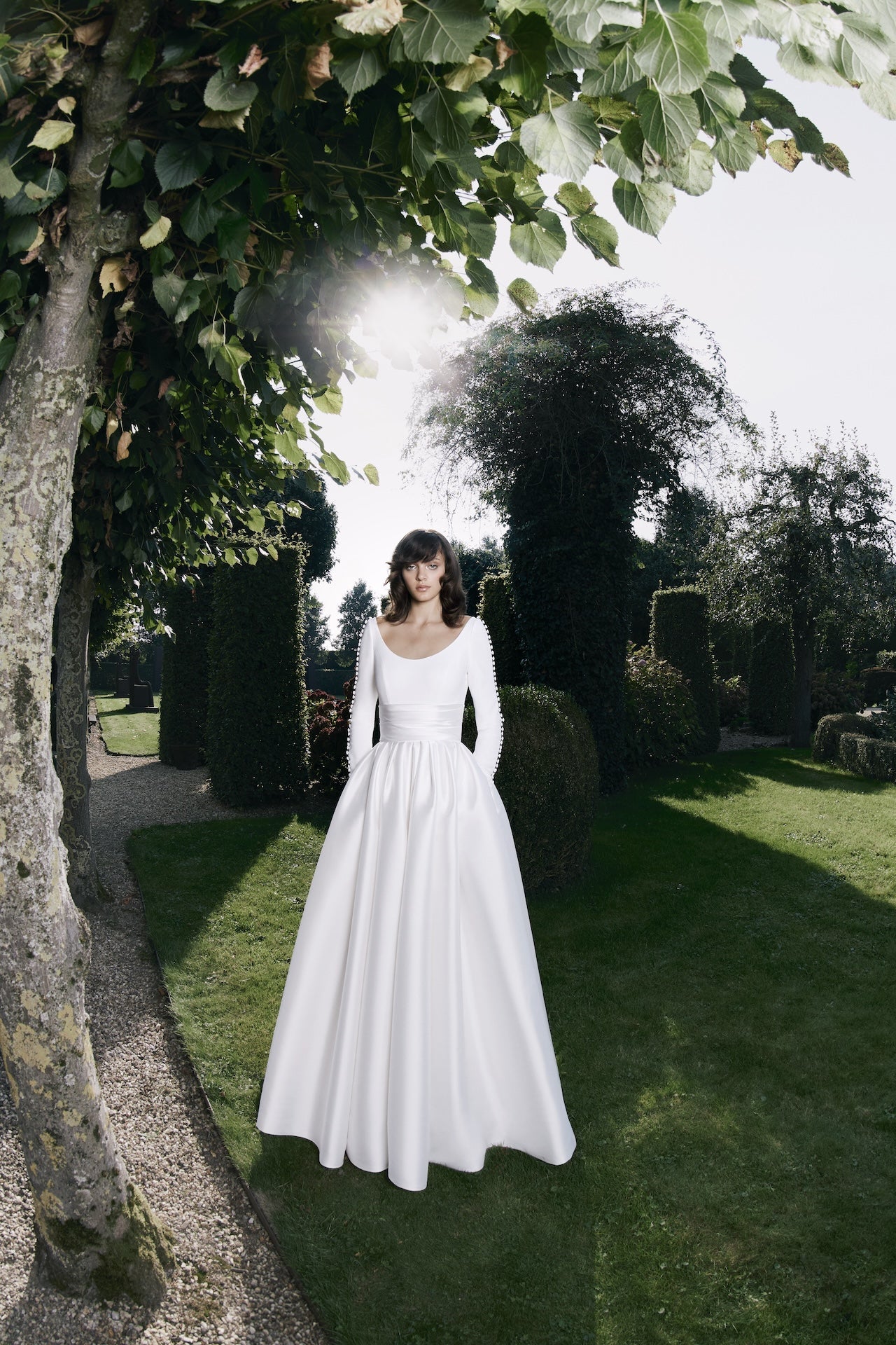 Viktor & Rolf Mariage Bridalwear Autumn Winter 25 Collection, featuring an elegant A-line gown with refined minimalistic design.