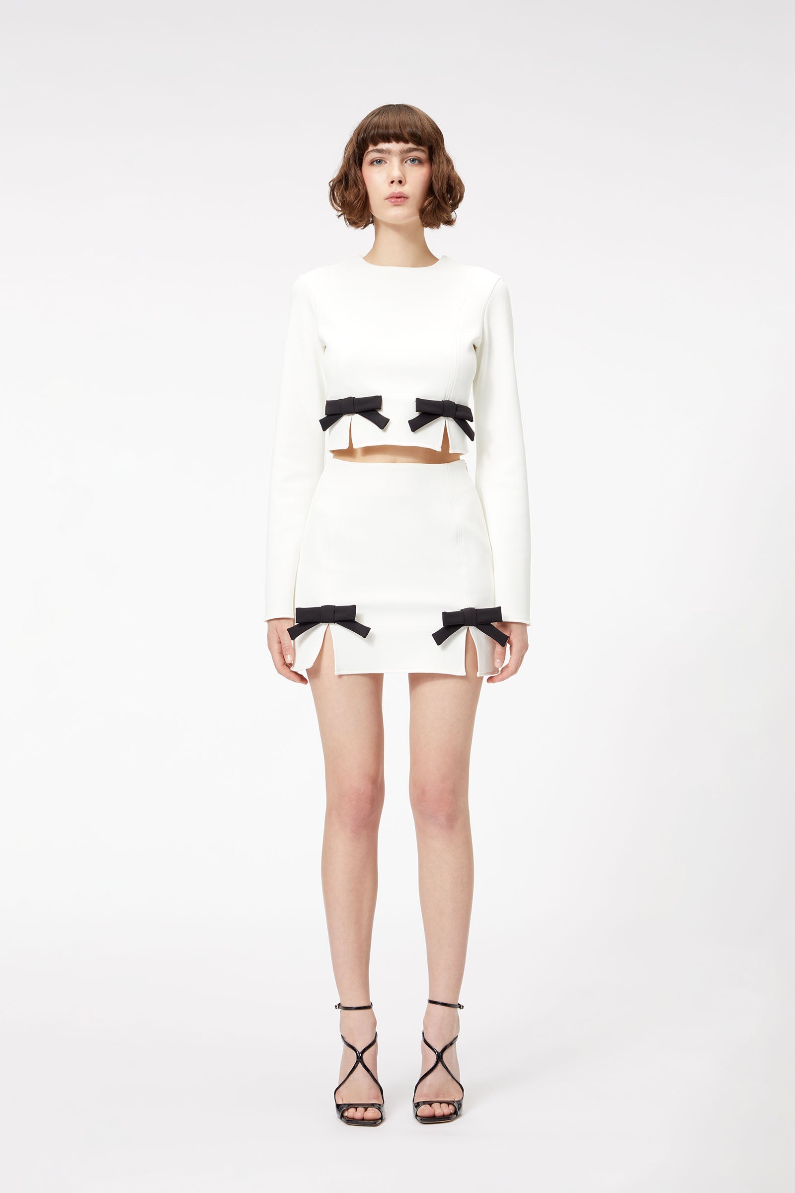 Dress designer created mini skirt sales