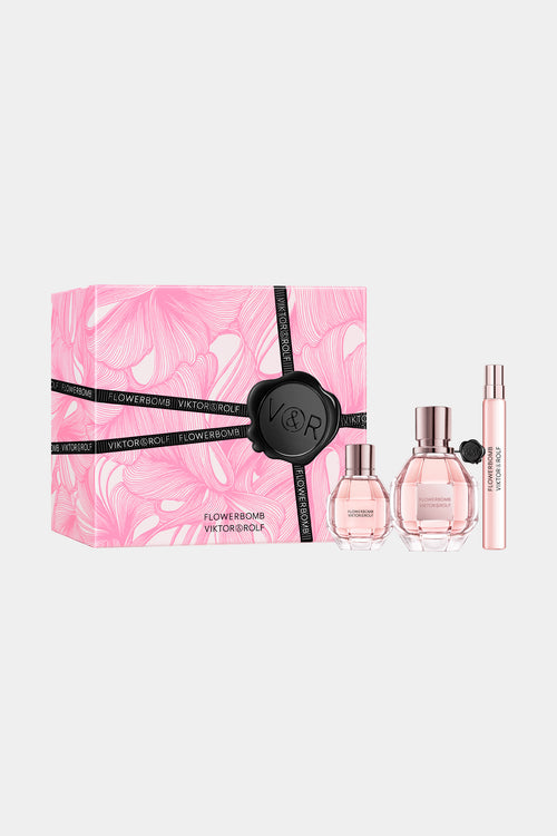 The Flowerbomb perfume trio gift set in a pink packaging on a white background.