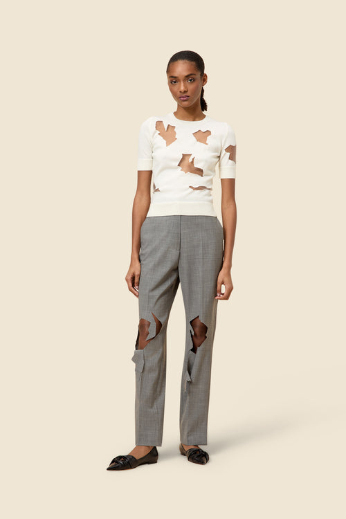 The laser cut hemlines and pleated japanese bonded satin embrace vitkor&rolf's scissorhands signature details in a dress