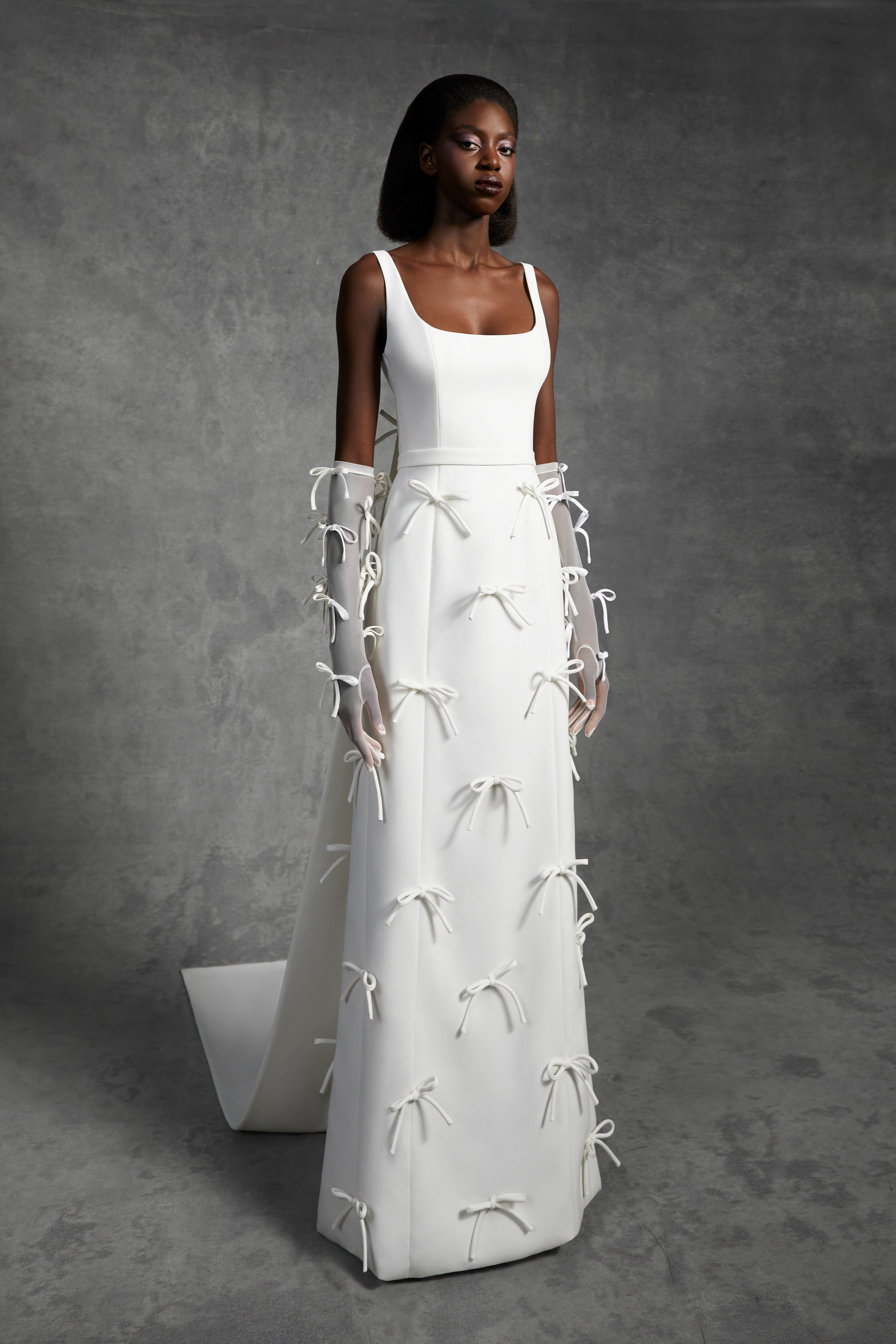 Timeless empire gown with a classic squared neckline and empire waistband, crafted from double-faced crepe with a matte finish