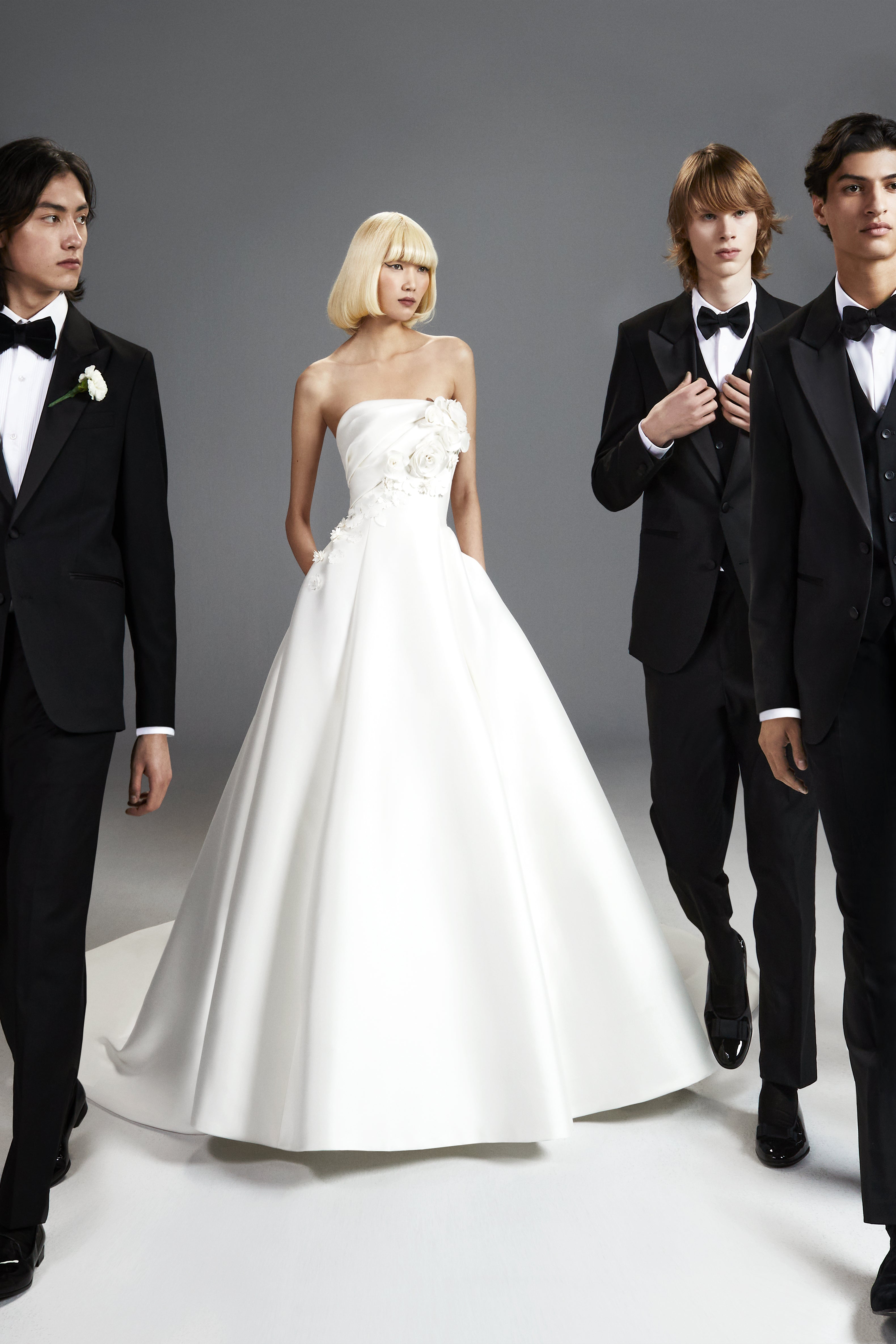 Viktor & Rolf Mariage Bridalwear Collection, elegant Flower Bouquet Gown with sculptural floral accents and couture design.