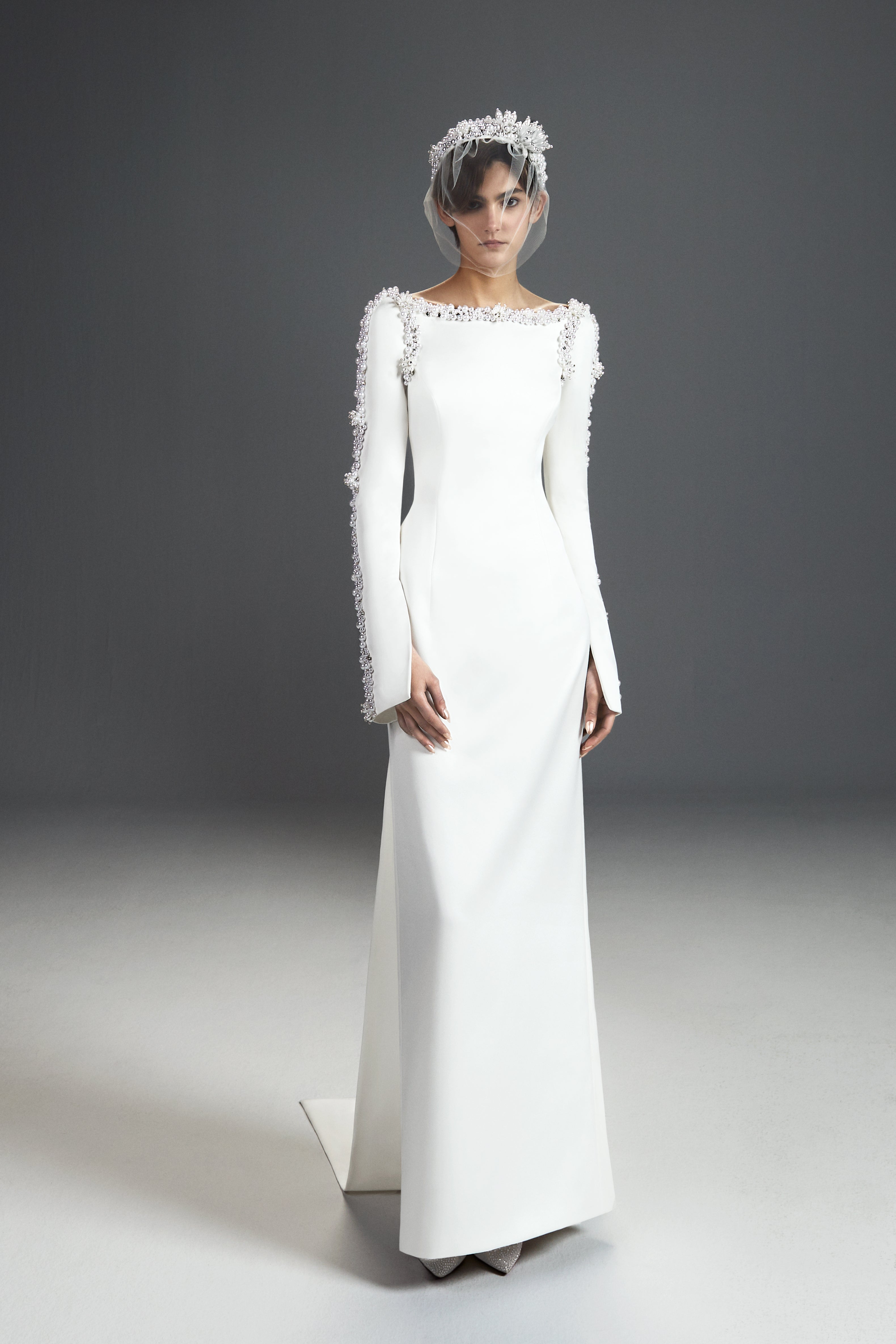 Viktor & Rolf Mariage Bridalwear Collection, Tales of Pearls column gown with elegant pearl detailing and modern silhouette.