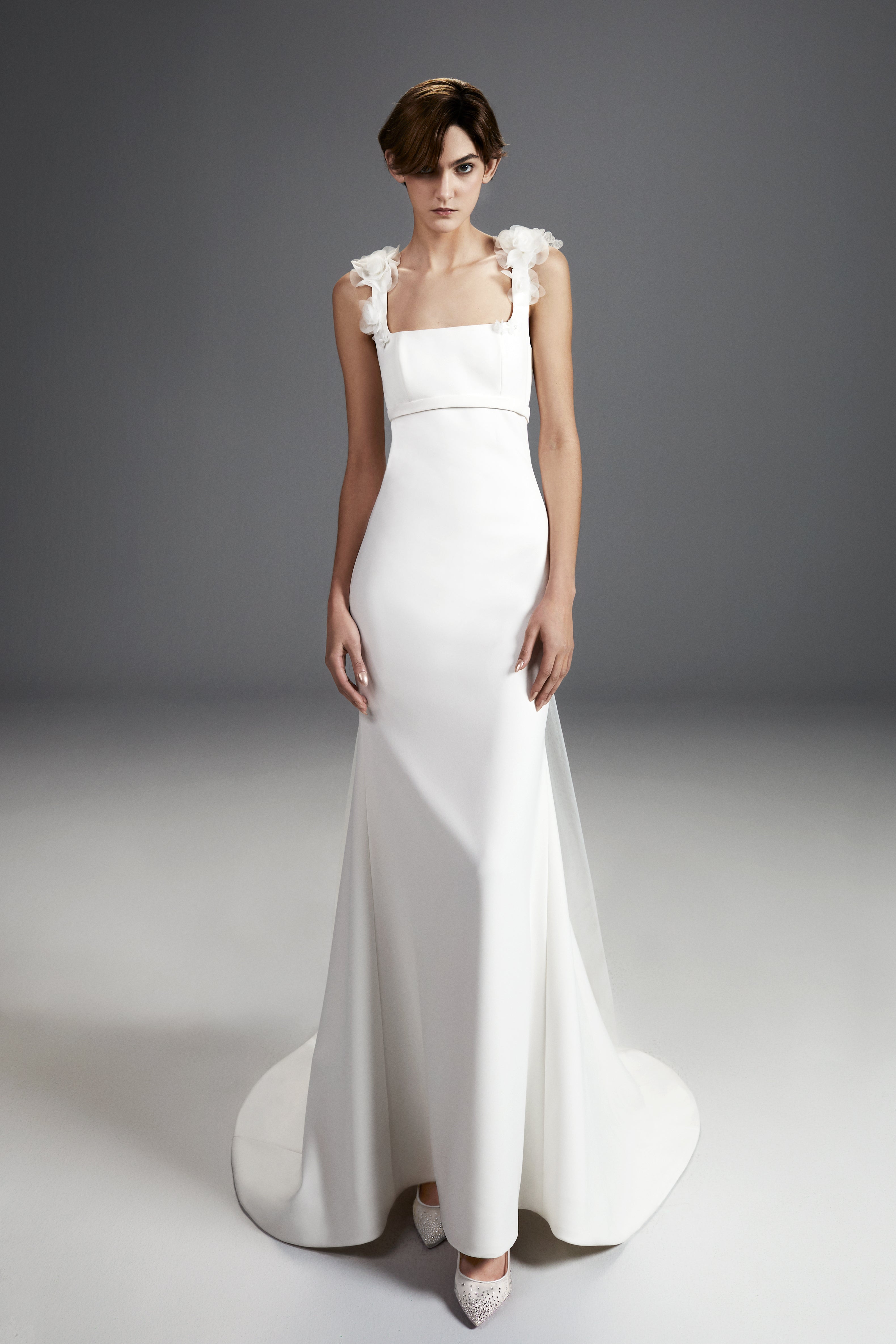 Viktor & Rolf Mariage Bridalwear Collection Flower Bouquet Column Gown, minimalist design with floral shoulder accents.
