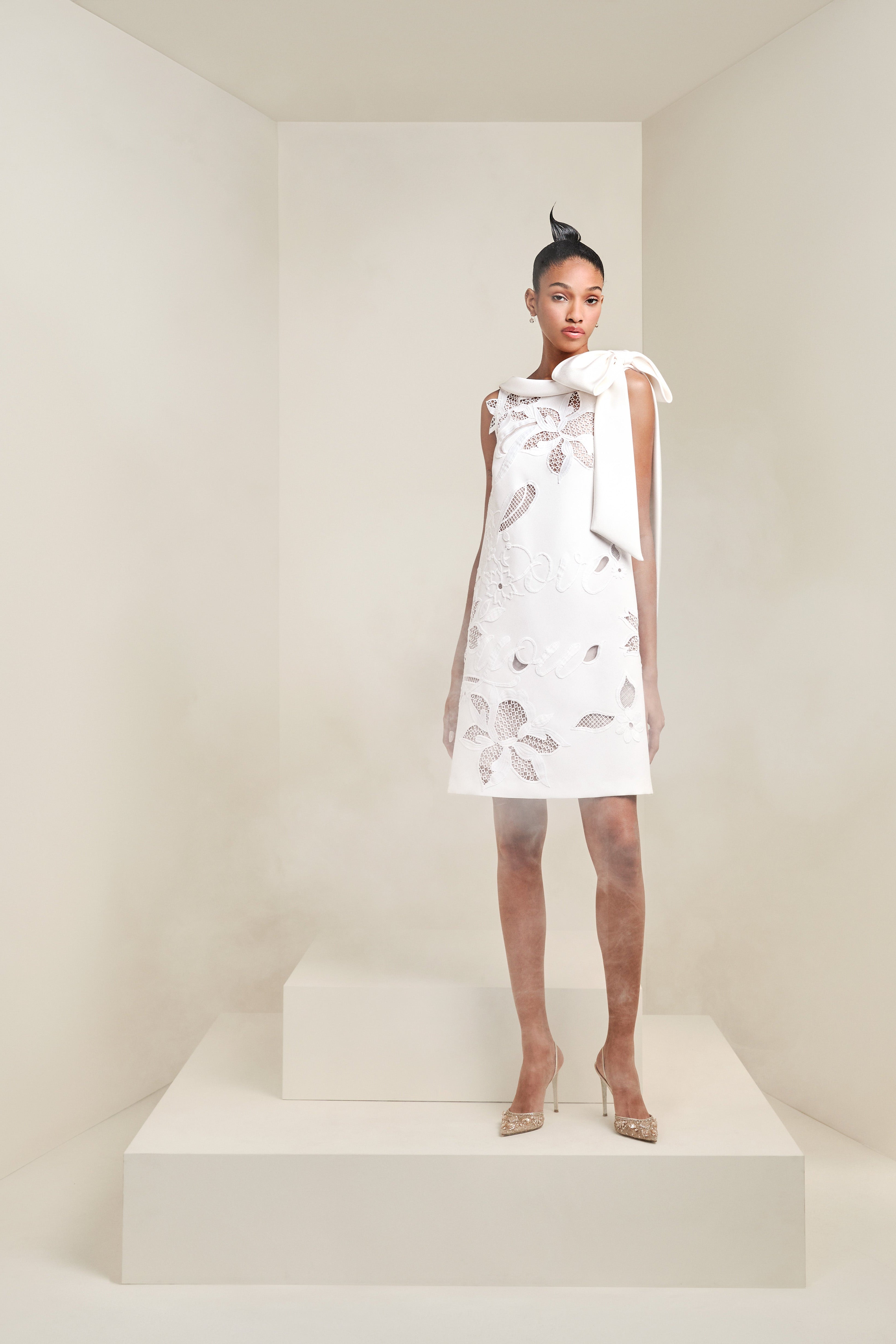 Beautifully embroidered shift dress crafted from luxurious double matte crepe