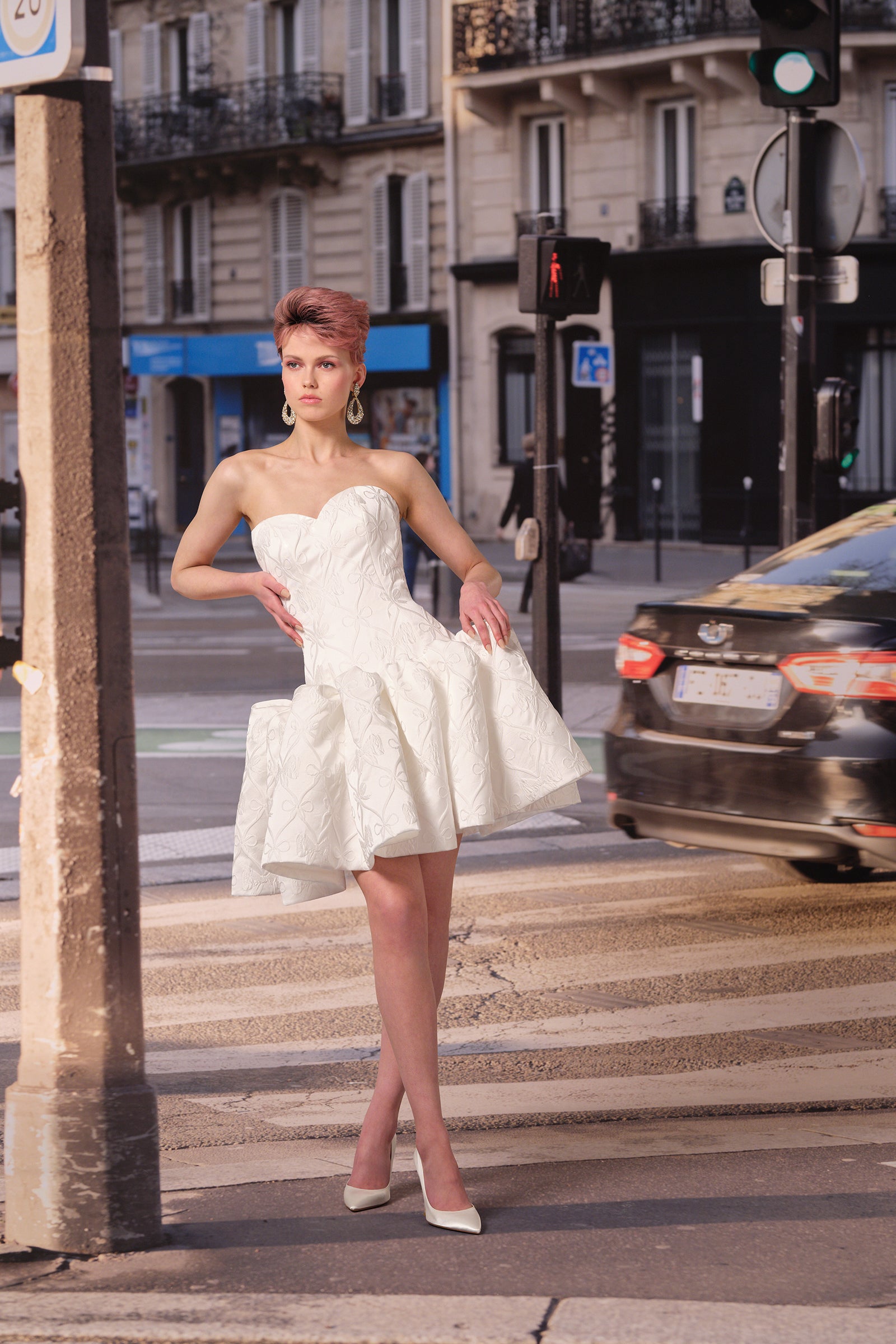 A playful mini dress crafted in our exclusive custom bow jacquard, from the Viktor&Rolf Mariage collection.