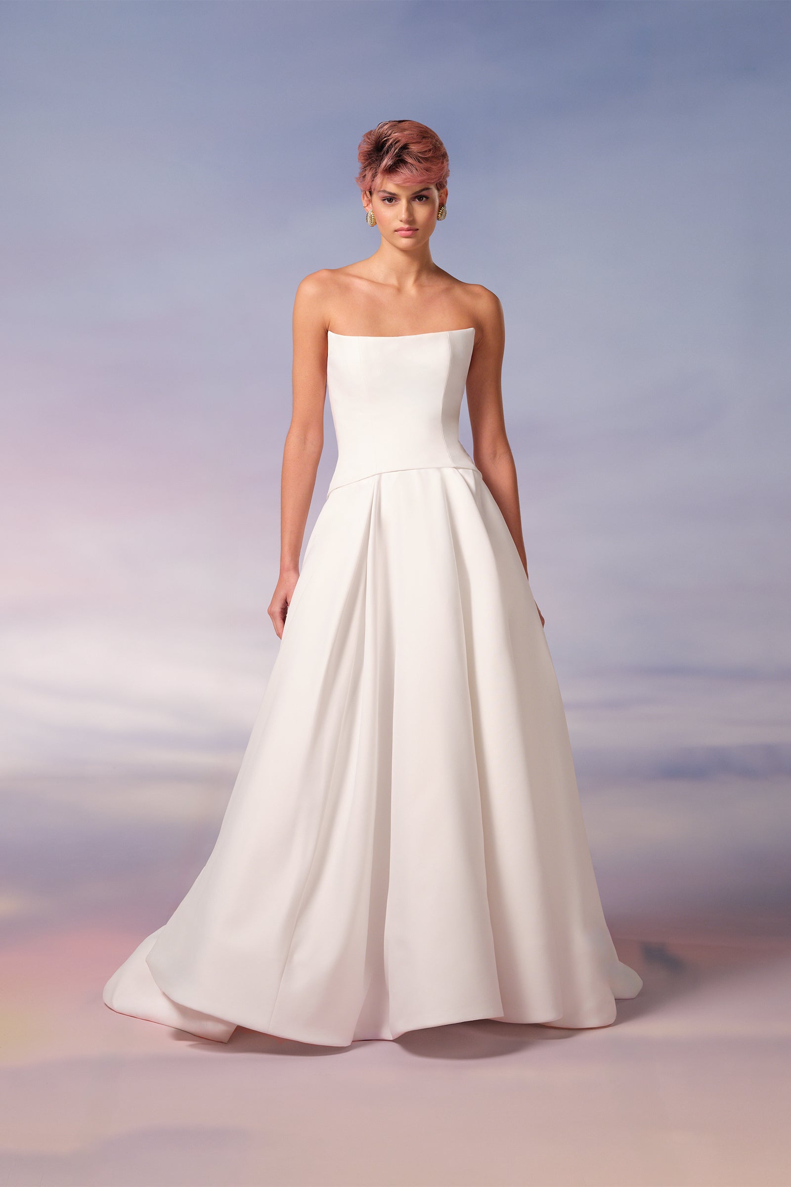 This light mikado a-line gown exudes regal elegance with its refined simplicity and dramatic details, from the Viktor&Rolf Mariage collection.