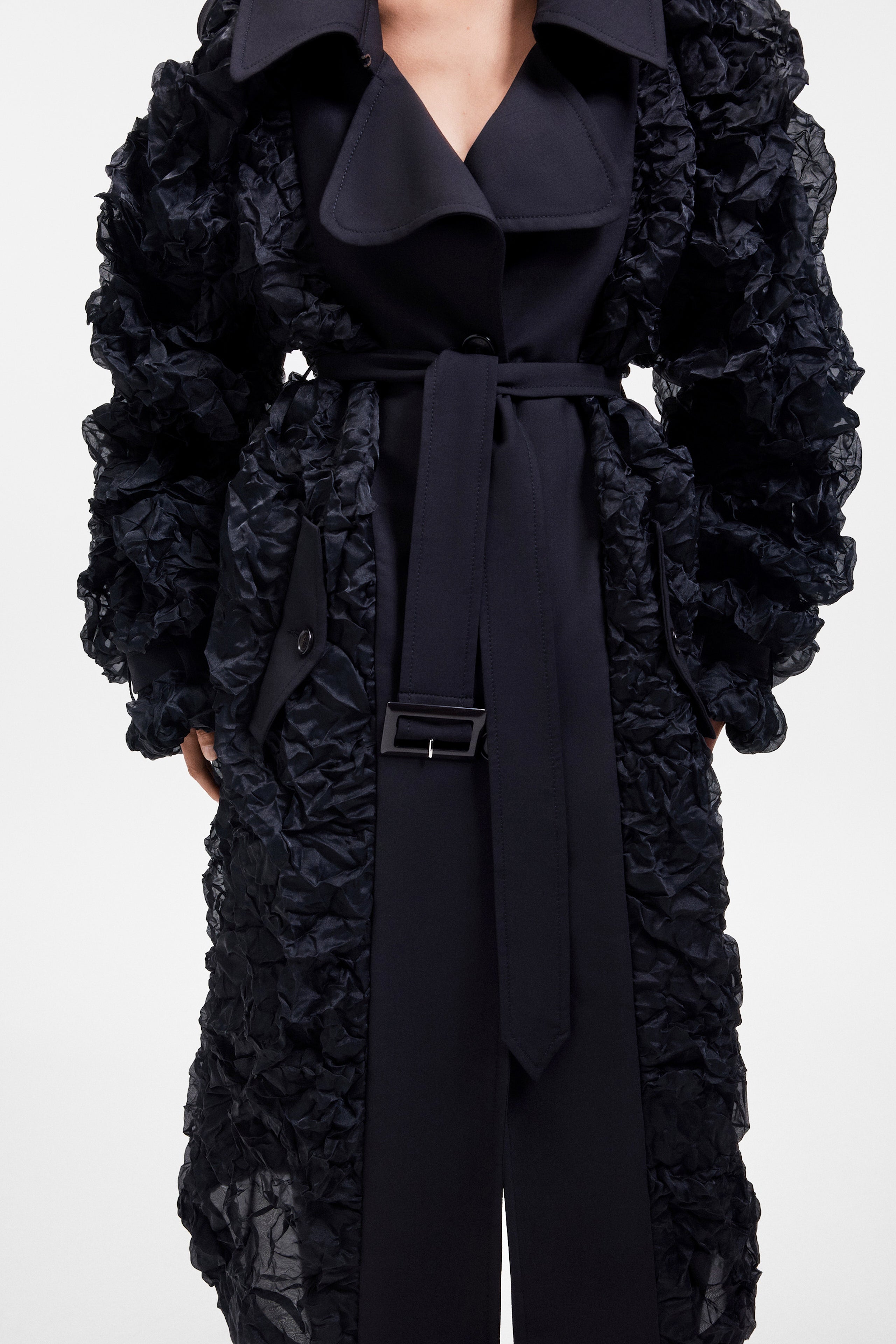 TRENCHCOAT MET PLISSÉ