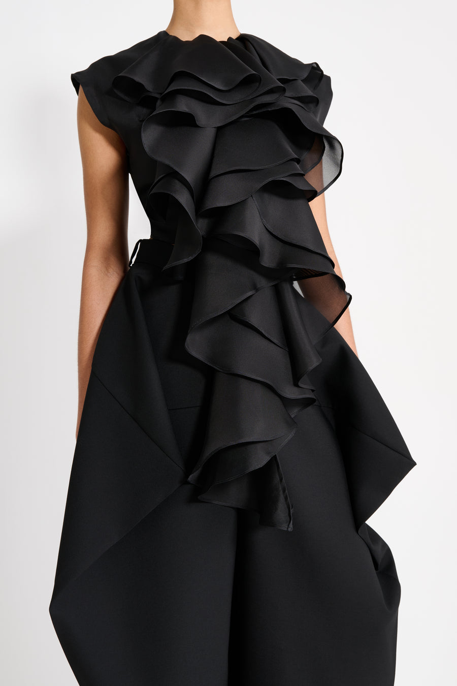 Black ruffled dress on a white background