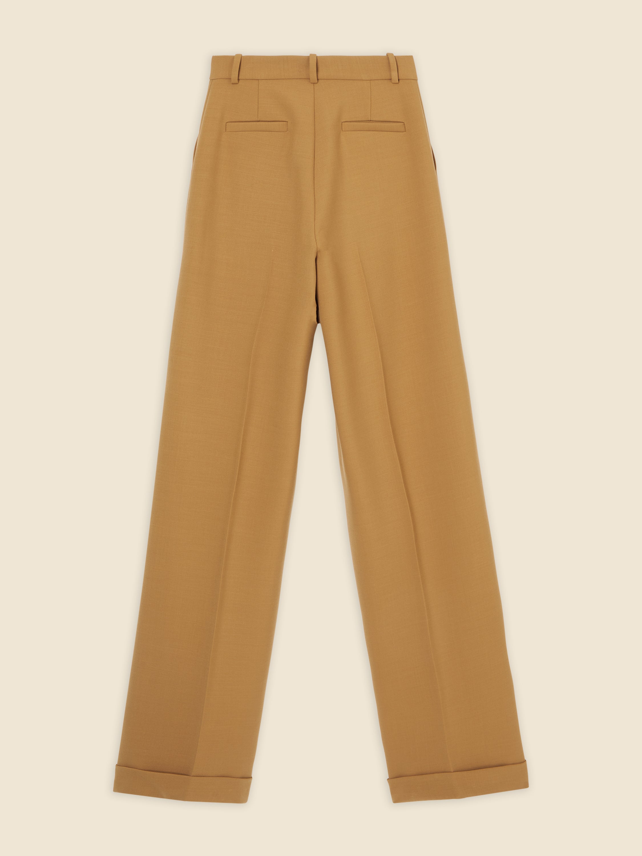 Tailored high-waisted camel wool trousers with welt back pockets and cleanly finished cuffs, exuding classic sophistication.