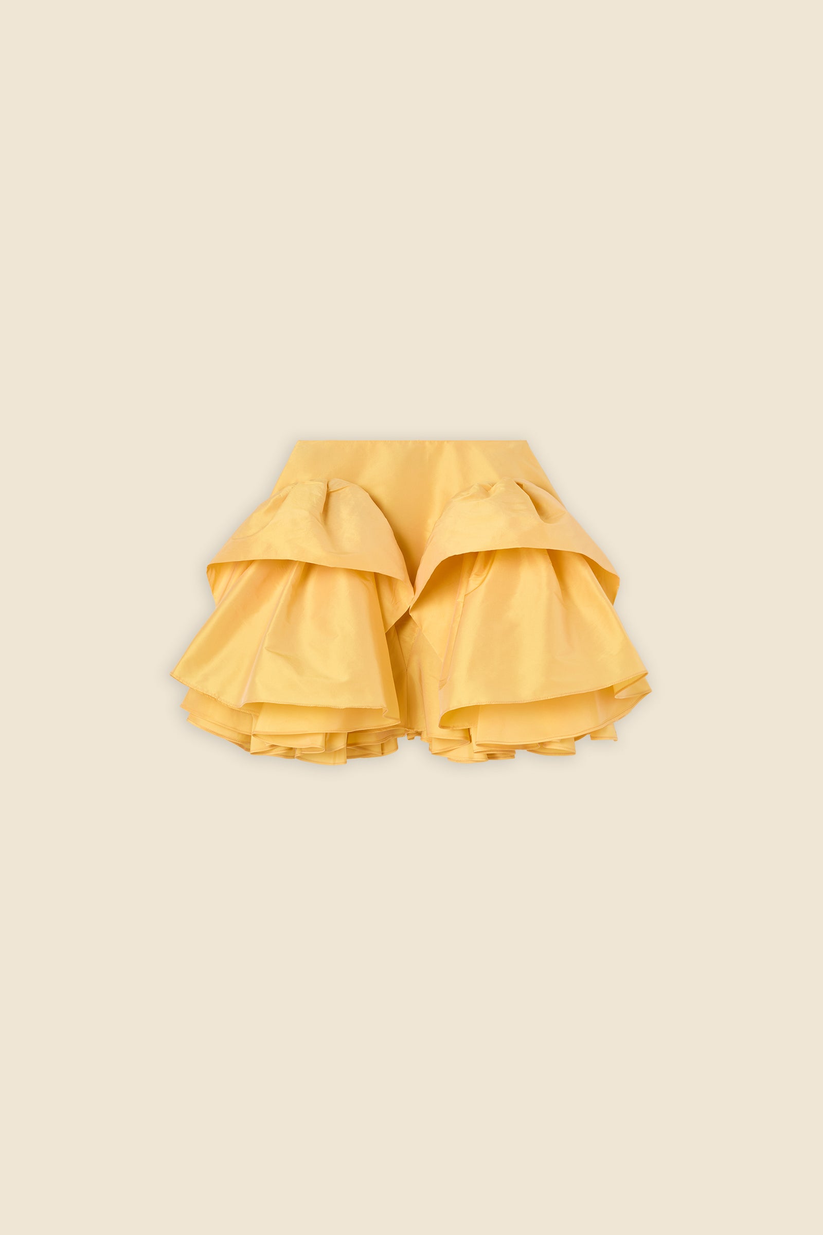 The craftmanship of the skirt reinterprets classic haute couture tuck ups into a modern silhouette from silk-blend taffeta