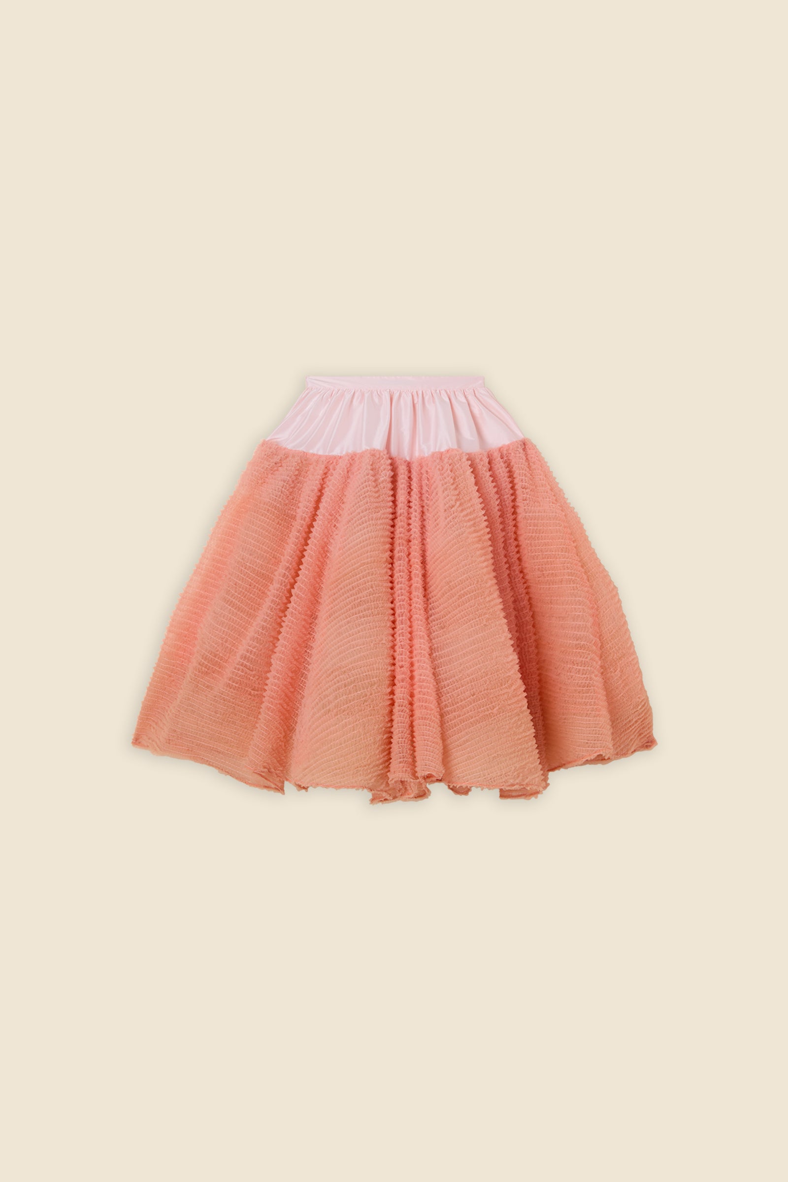 Inspired by the tulle from the ‘late stage capitalism waltz’ haute couture collection, the skirt features hand crafted tulle ruffles for a feminine texture