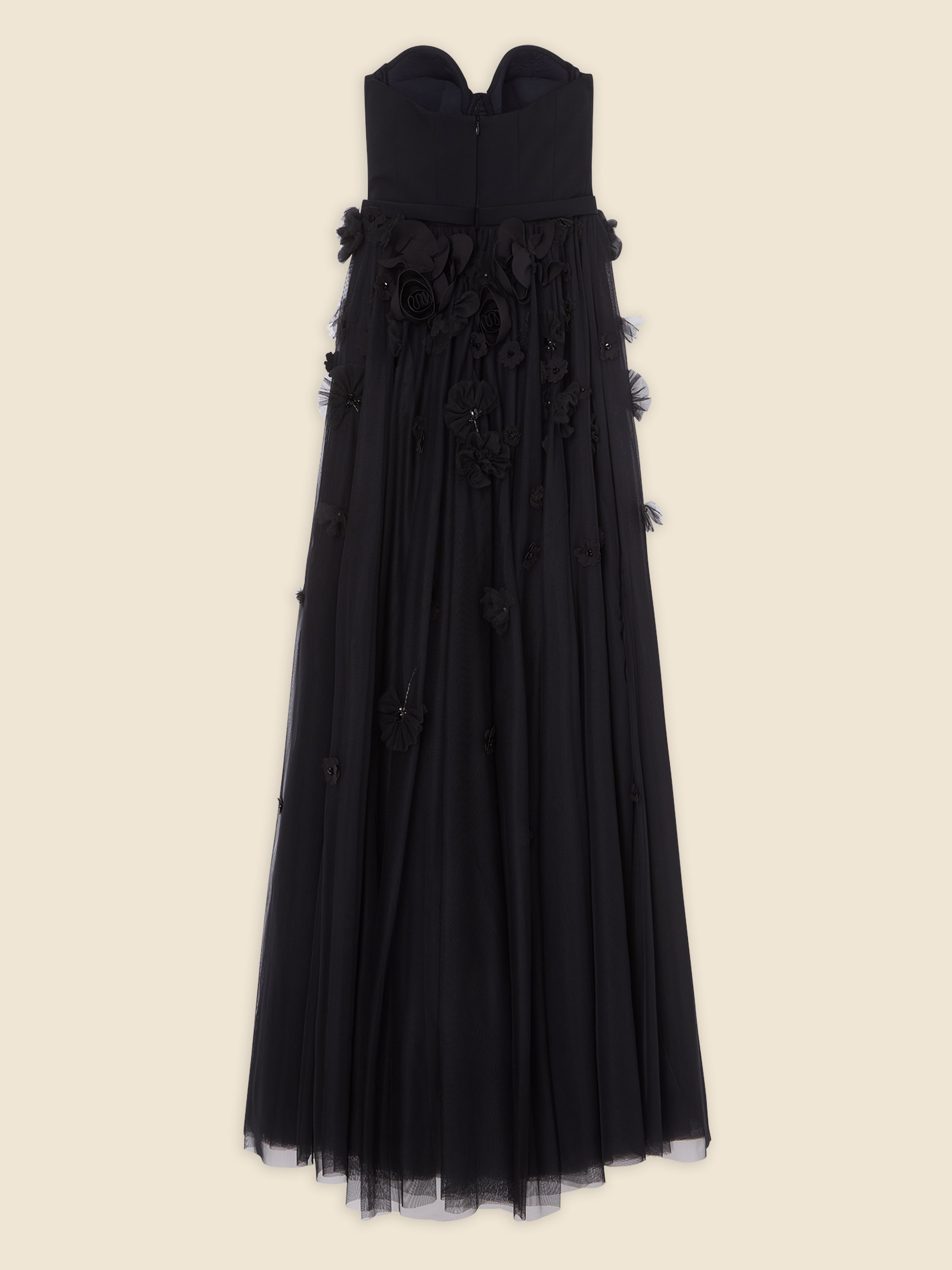 Elegant black evening gown with strapless design and intricate floral details on the bodice and skirt, set on a plain background.