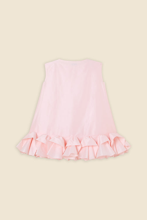 The craftmanship of the dress reinterprets classic haute couture tuck ups into a modern silhouette from silk-blend taffeta