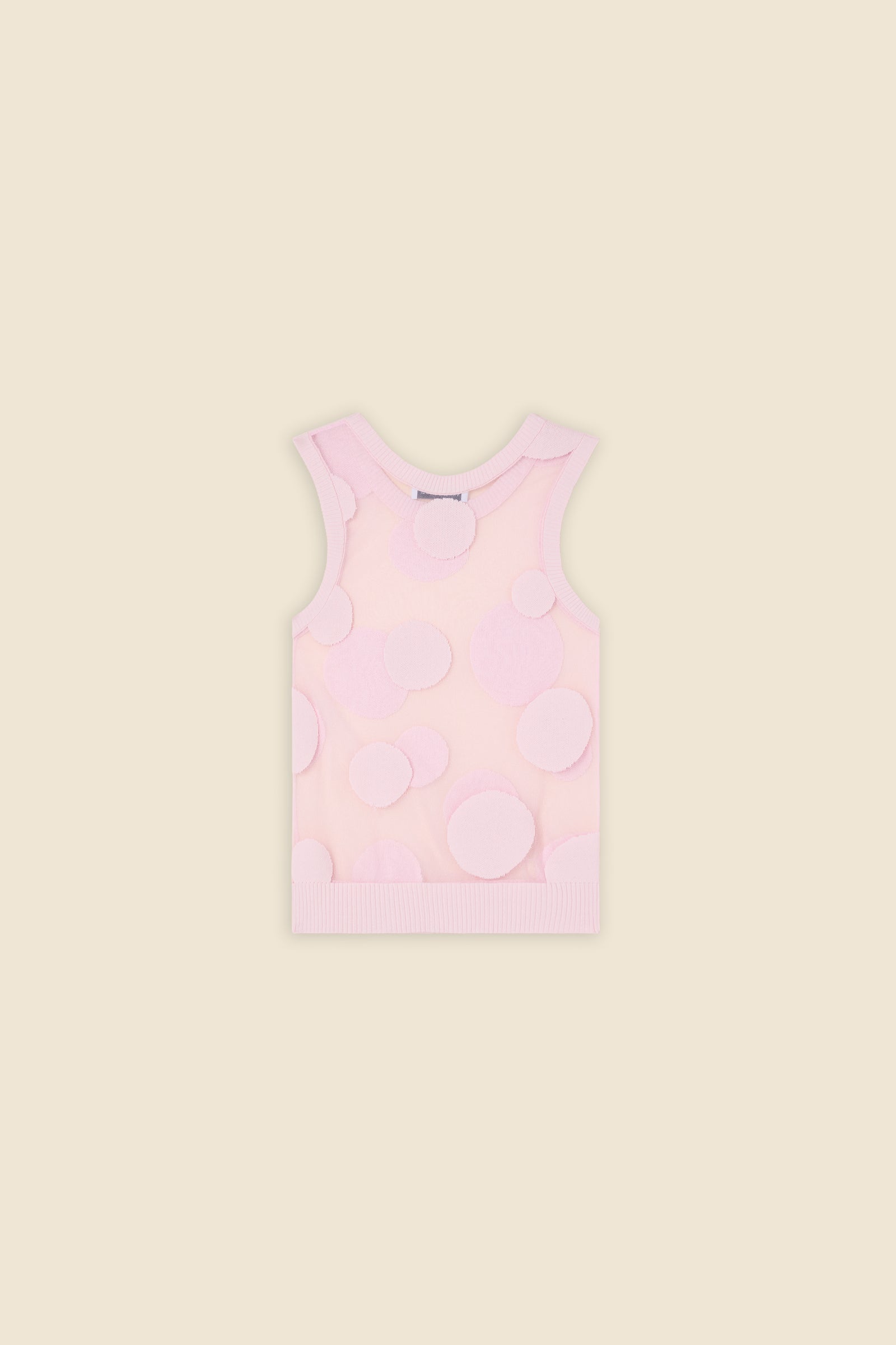The classic pattern of the top is given a modern twist with intricate polka dot hole design on knit jacquard