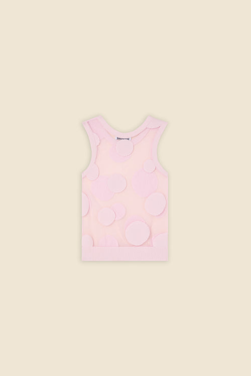 The classic pattern of the top is given a modern twist with intricate polka dot hole design on knit jacquard